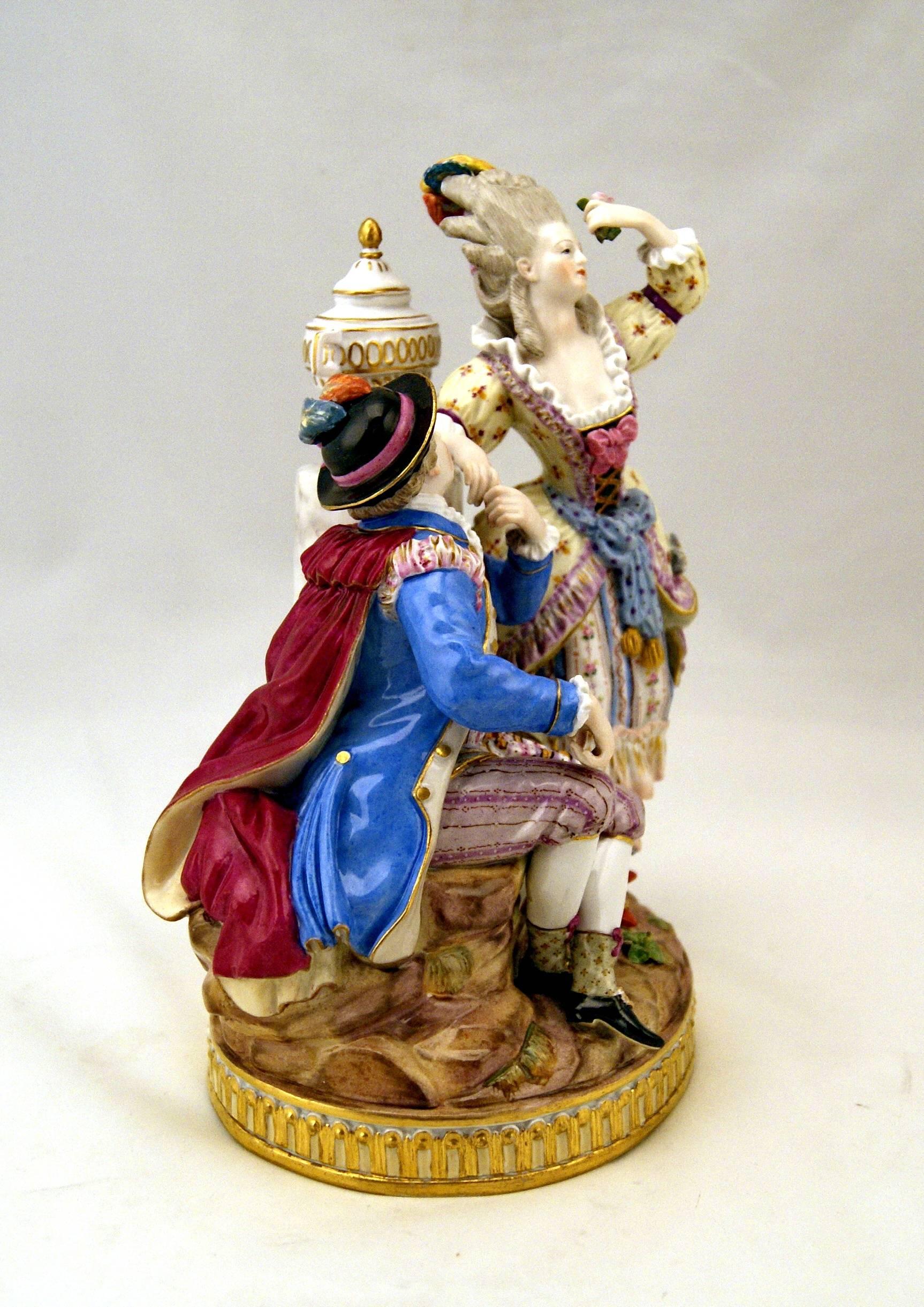 Meissen gorgeous figurine group of finest quality: 
There are two figurines - a couple - visible, both clad in finest rococo garments.

Manufactory: Meissen.
Dating: Mid-19th century made circa, 1860-1870.

Model number f 98 / former's number