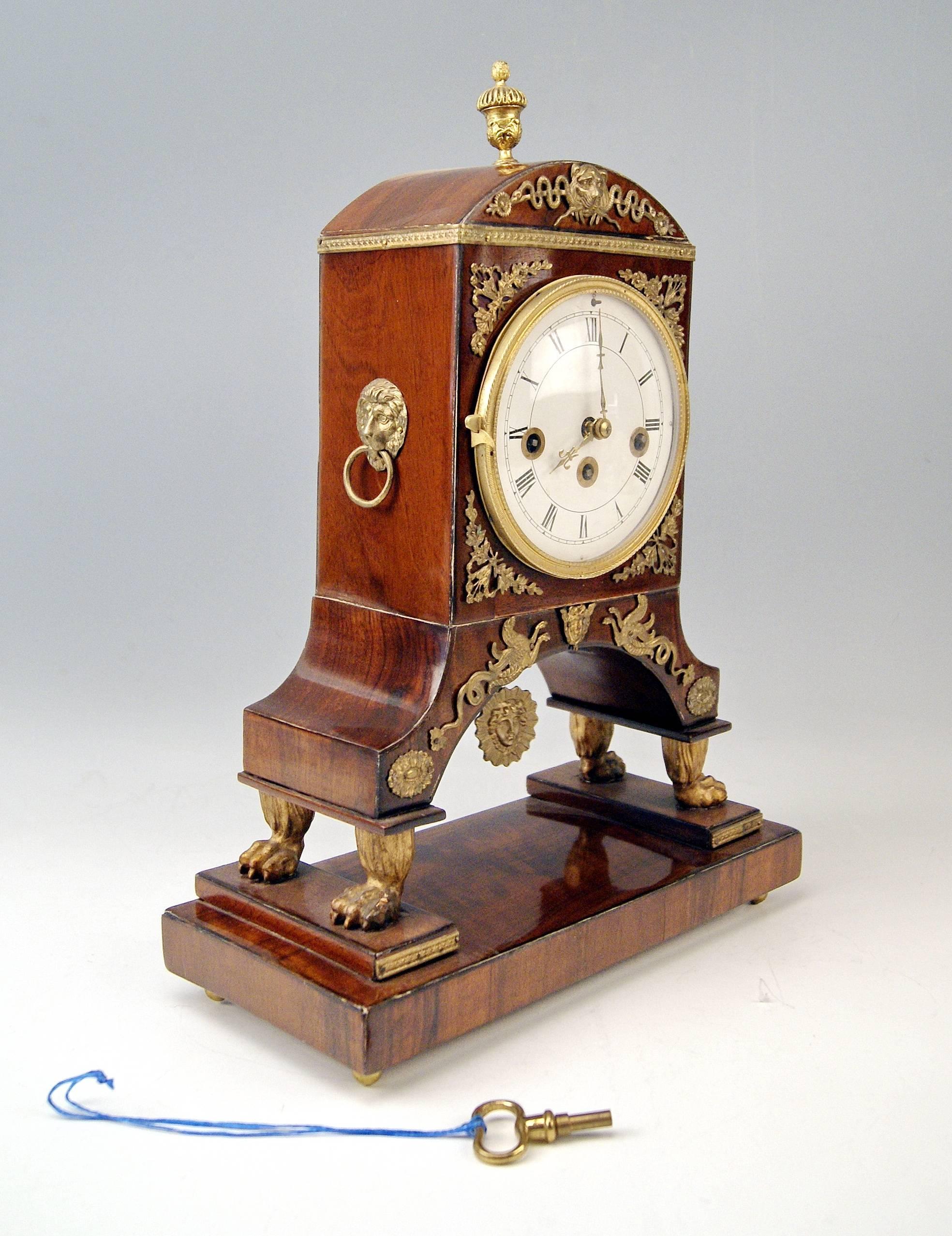 Subject:
Viennese gorgeous mantel/mantle/table chiming clock, main parts made of wood. Explanation: Mantel clocks or shelf clocks are house clocks traditionally placed on the shelf, or mantel, above the fireplace.

Manufactory: Viennese