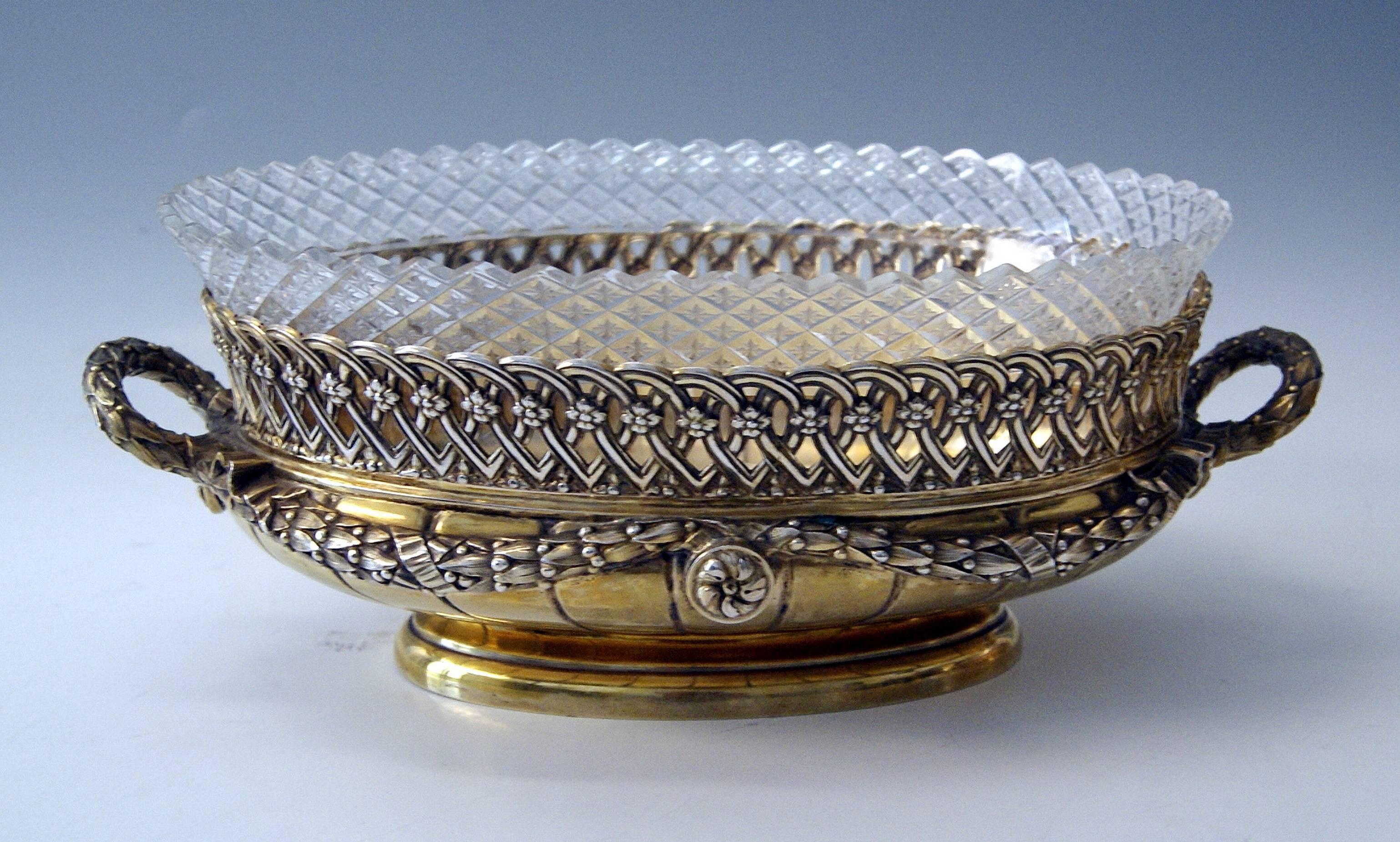 Silver German nicest pair of flower bowls / centerpieces with original elegant glass liners.
Transition period / Historicism - Art Nouveau (made circa 1880-1900).

Silver 800
branded by German Crescent with Crown.
Manufactory:
Hallmarked by