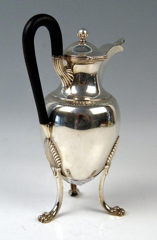 Silver most elegant chocolate/coffee pot.
Empire Period/made circa 1809-1819.

Excellently made silver pot of finest quality.

The pot's form type is that of a pear-shaped item attached to three feet shaped as lion's paws:
This most elegant pot has