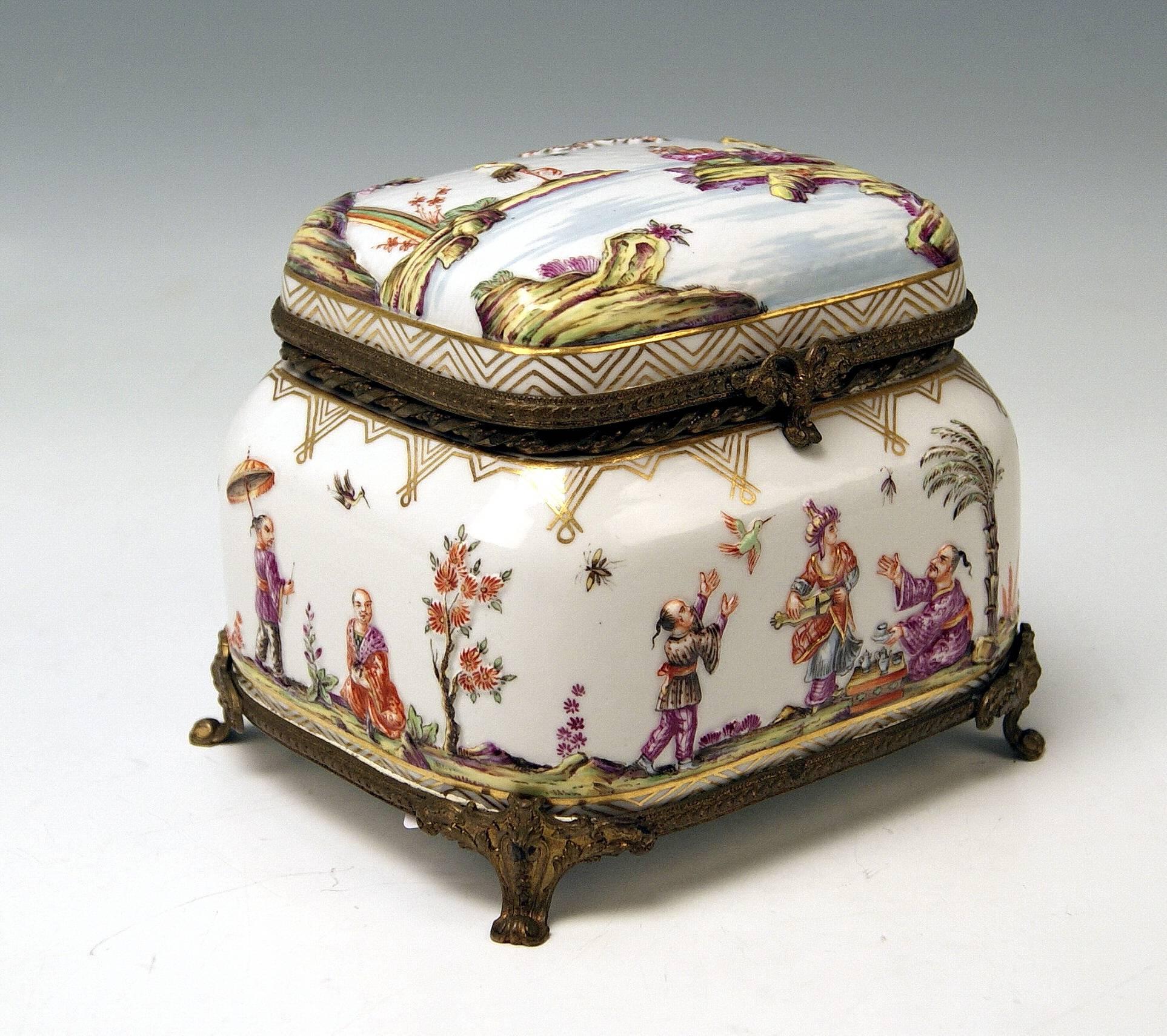 Meissen gorgeous lidded box with multicolored decorations (chinoiserie) of relief type, the box is edged by brass mountings, circa 1850.
Measures:
Height: 12.5 cm (= 4.92 inches).
Width: 14.0 cm (= 5.51 inches).
Depth: 11.5 cm (= 4.52 inches).
