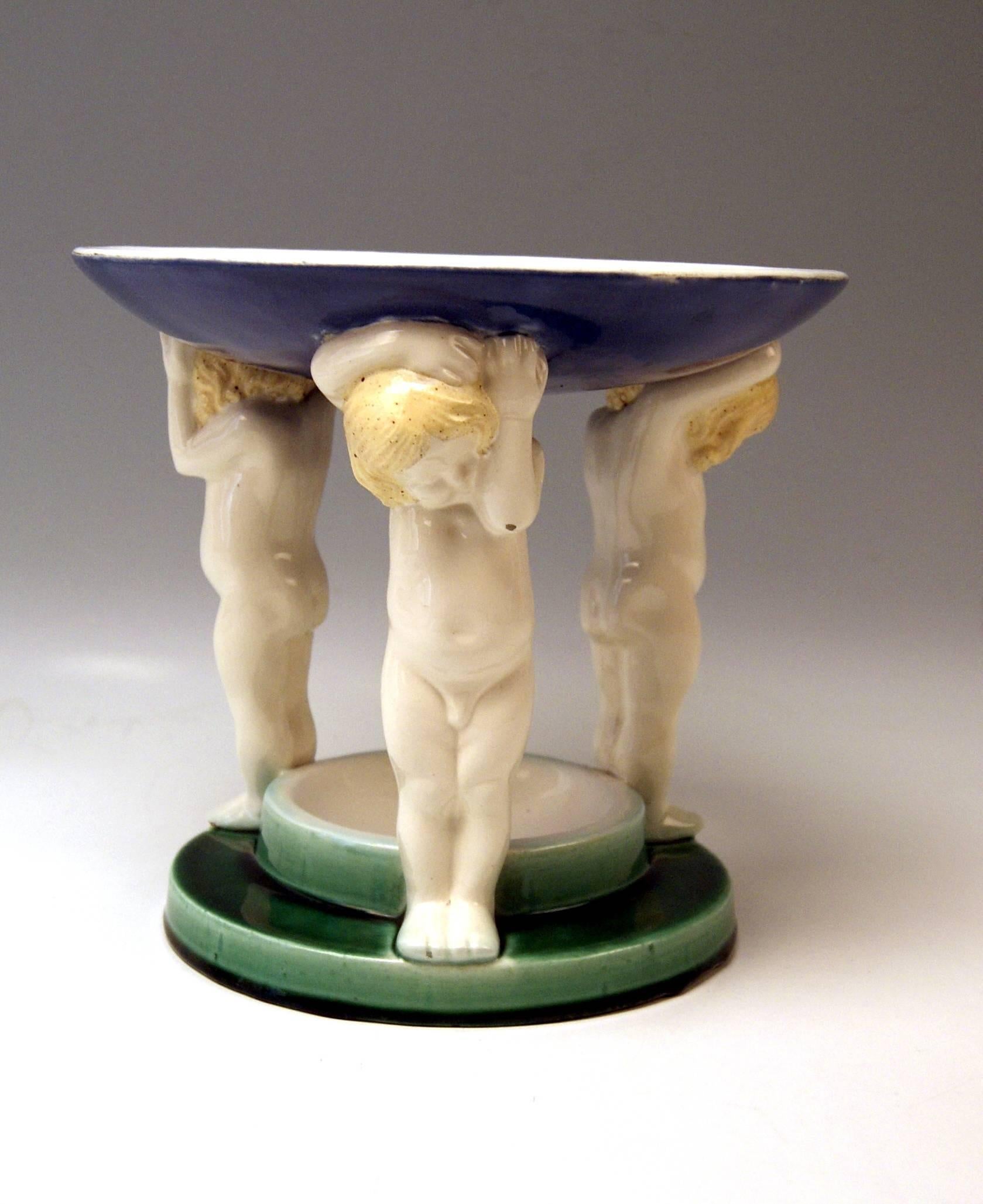 Michael Powolny Art Nouveau centrepiece with three cherubs - most lovely ceramics item!
Modelled by Michael Powolny (1871 - 1954), circa 1907.

 Hallmarked:
 Manufactured by Wiener Keramik (Vienna Ceramics) (WK / hallmarked).
 Material is ceramics