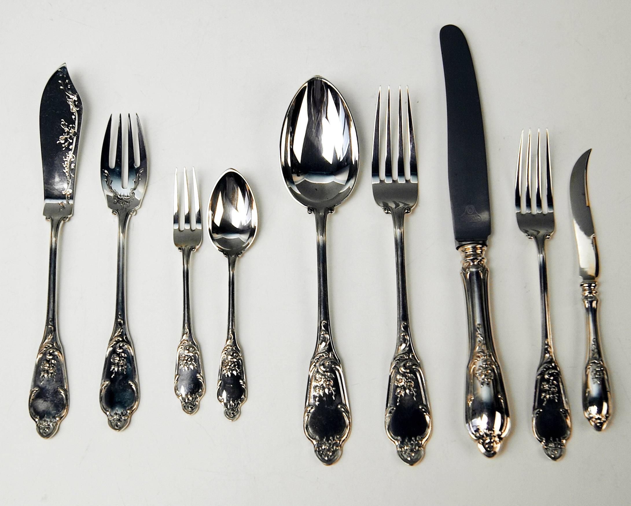 Gorgeous German cutlery service / flatware / dinnerware consisting of 108 pieces. Most elegant design = ROCOCO STYLE hallmarked by SILVER MANUFACTORY OF SAUERLAND BROTHERS (Berlin / Germany).

Chest:
Additionally, this cutlery service is kept in