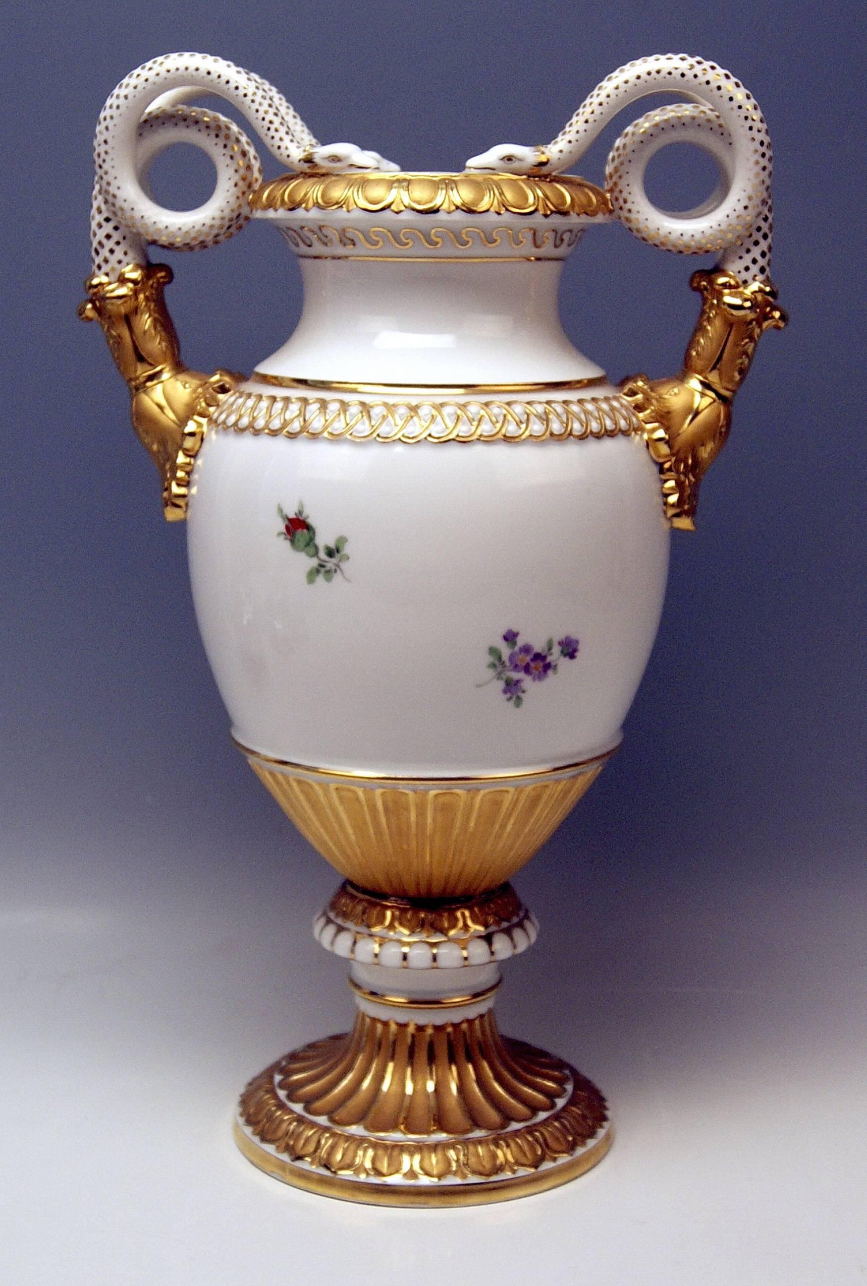 Meissen outstanding quite tall snake handles vase.

Measures:
Height 38.5 cm (= 15.15 inches) 
width (measured from one handle to other) 24.0 cm (= 9.44 inches)
diameter of round foot 14 cm (= 5.51 inches) 

Manufactory: Meissen
Hallmarked: