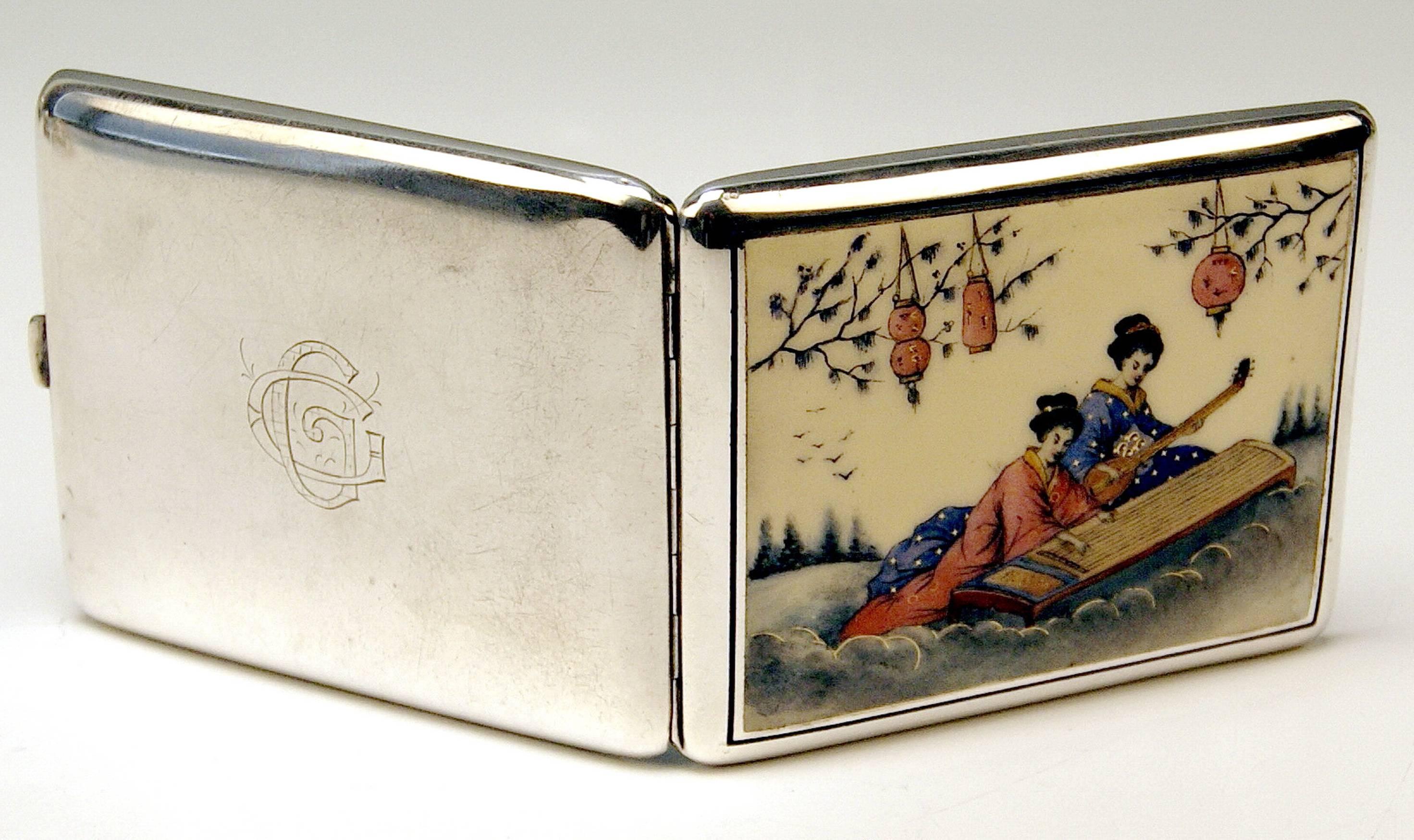 Gorgeous silver Art nouveau cigarette lidded box. 

The lid is decorated with stunning enamel painting - following scene is visible there: Two elegant Chinese Ladies clad in garments typical of this country are making music. One of them plays a