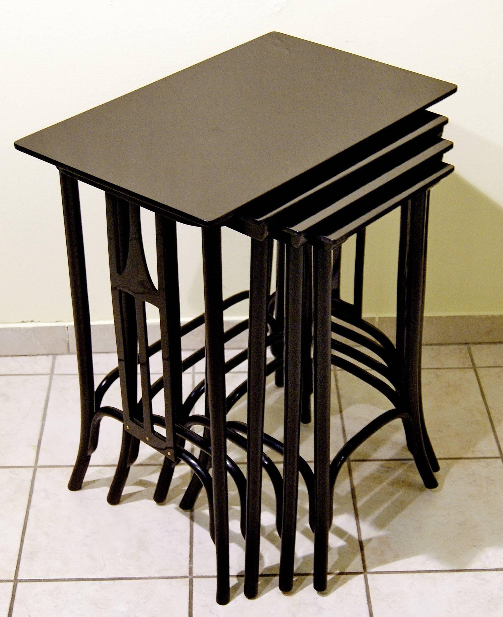 Jacob and Josef Kohn side tables/nesting tables,
Model number 958 A, set of four pieces. 
Beech wood/black stained/refurbished by hand.
Excellent condition,

Vienna, made circa 1906.

Original vintage furniture deriving from manufacturing