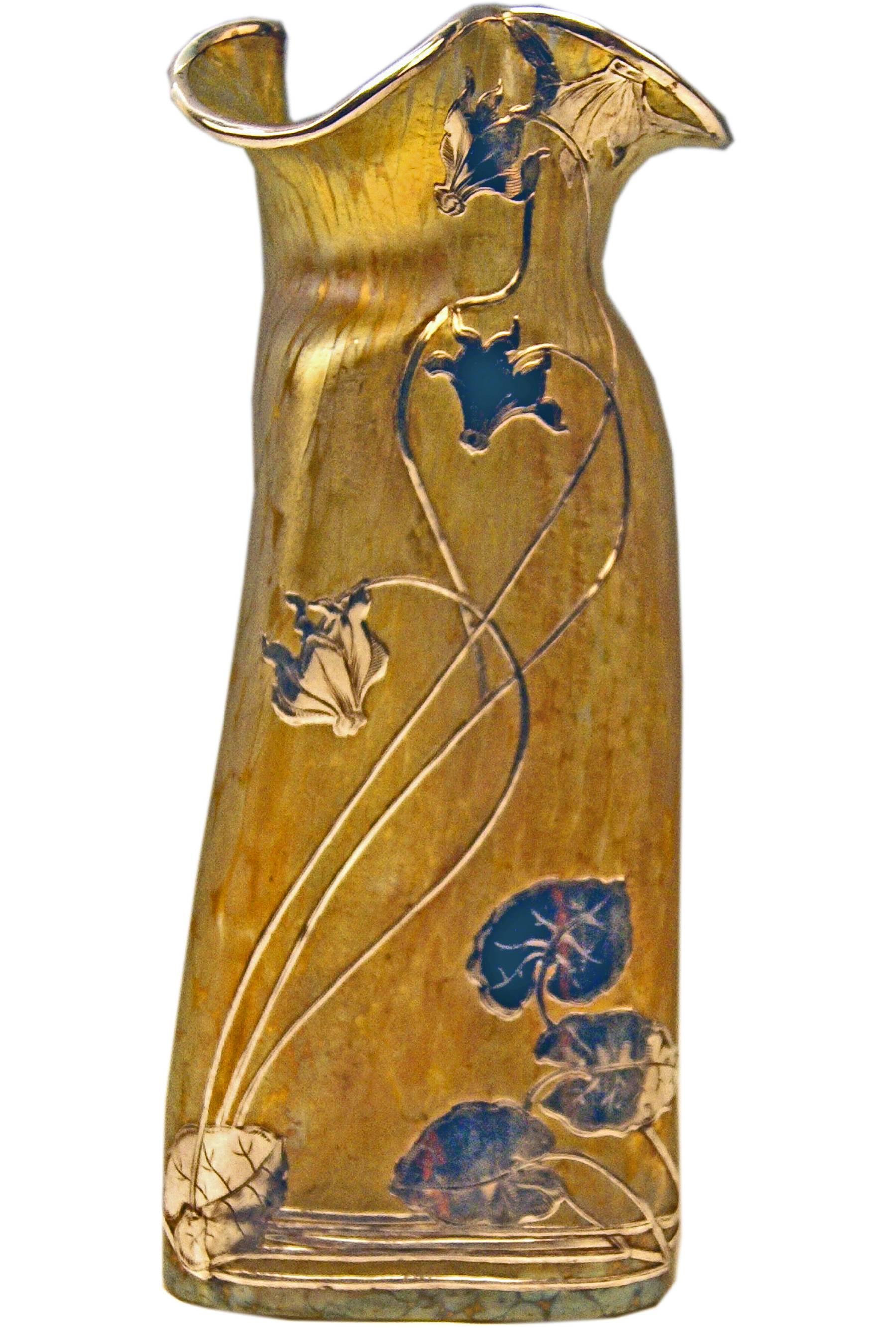 Made by Loetz, Klostermuehle (Bohemia) / circa 1900.
Decor: Candia Papillon 
(= colorless casing glass decorated with stunning iridescent golden-yellow spots and finest silver overlay).

Detailed description:
Vase Loetz (Lötz) Widow