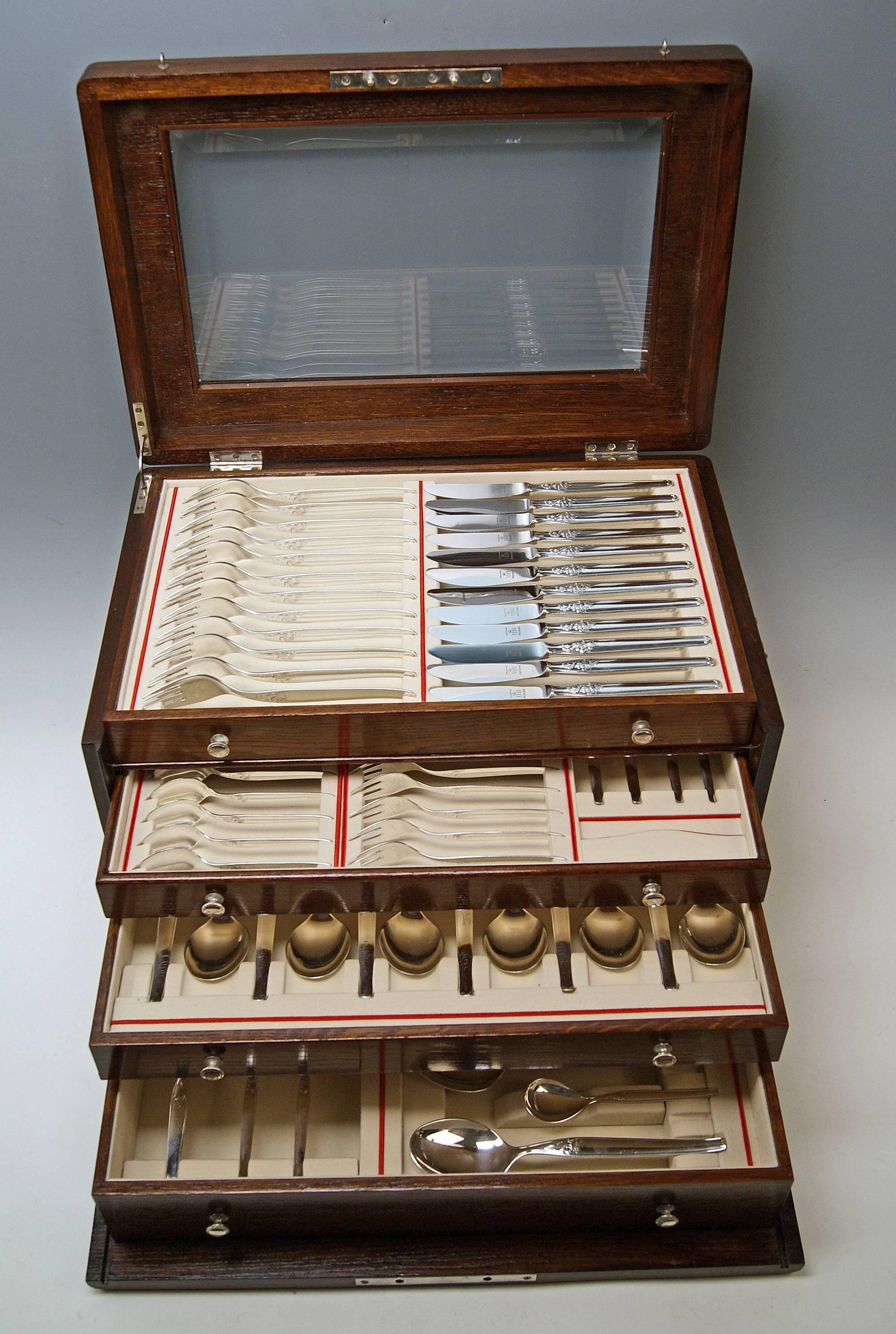 Silver 72-piece flatware (cutlery set) for 12 persons,
Made by Bruckmann & Sons, Germany / Heilbronn, circa 1960.

Gorgeous German cutlery set / flatware / dinnerware consisting of 72 pieces. Most elegant as well as rare design = Model Number 764