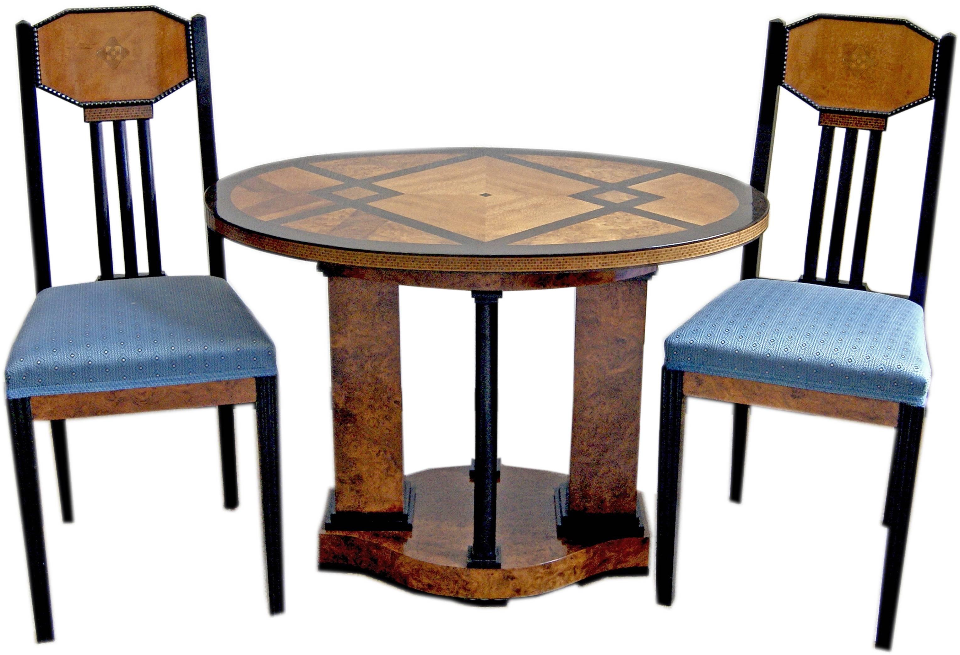 Gorgeous Art Nouveau table with two chairs of finest manufacturing quality.

Designer:
Attributed to circle of Josef Maria Olbrich (1867 - 1908).
Olbrich, the world-famous Austrian architect and co-founder of the Viennese Secession, had studied