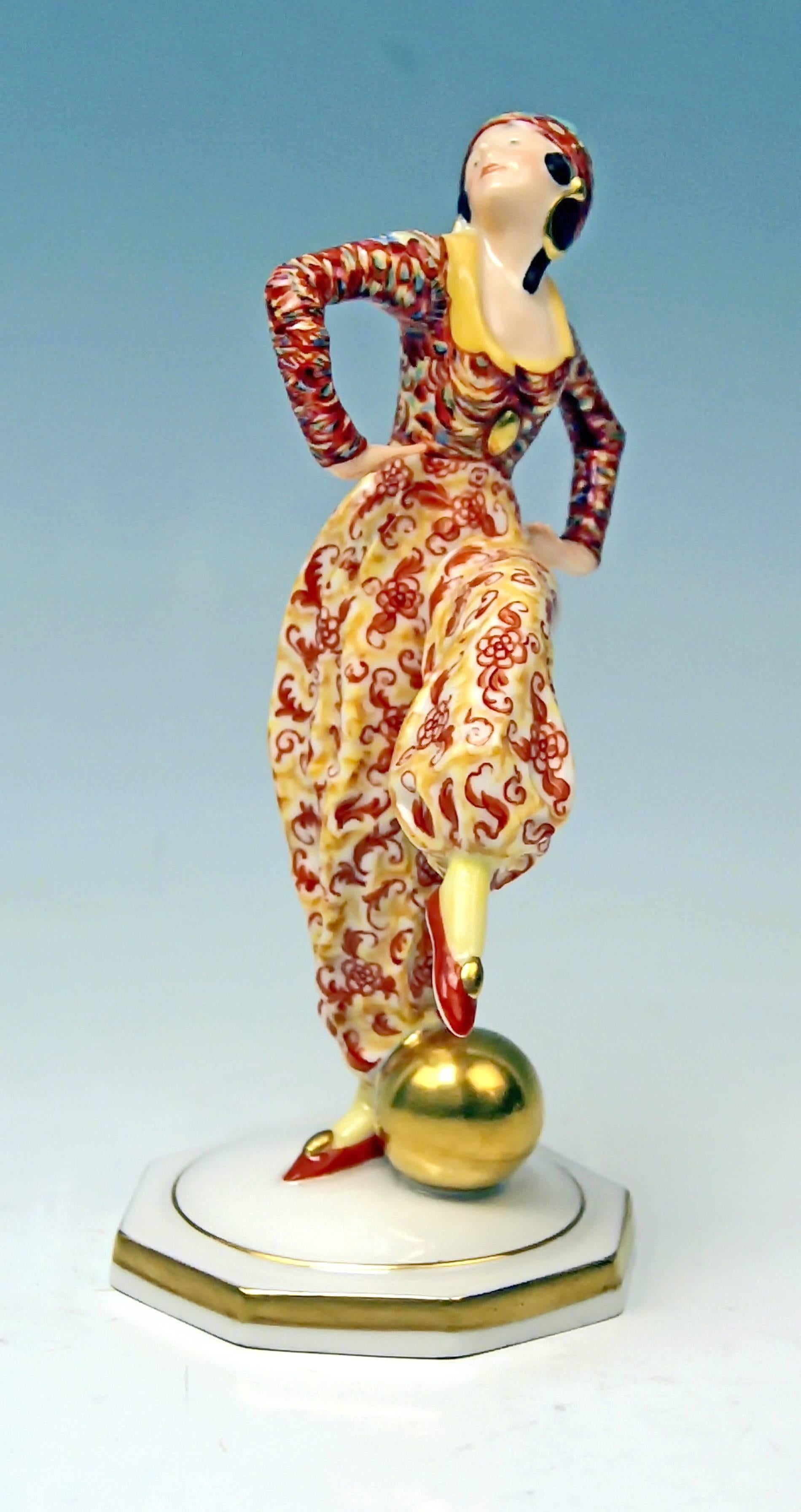 Hutschenreuther quite rare figurine of lady:
A gorgeous lady dancer - called 'oriental dancer' - wearing so-said harem pants as well as close-fitting / body-fitting jacket balances on her right leg while left leg - being sprawled out - is bent /