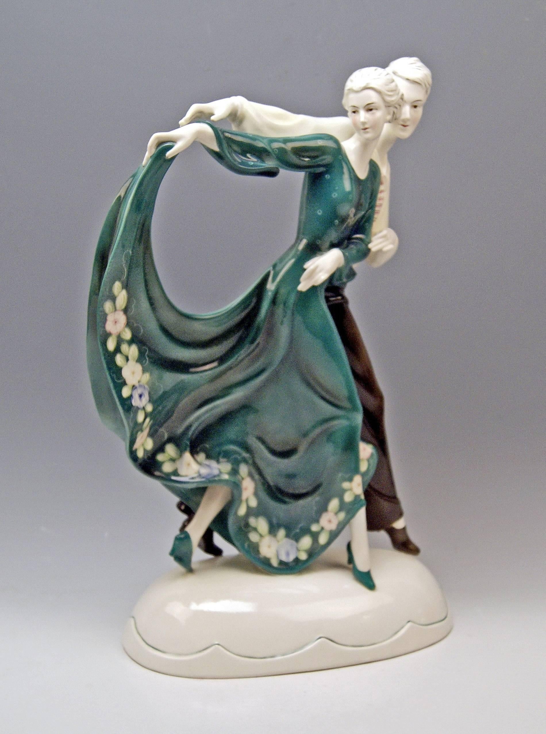 Stunning Art Deco tall dancing couple, manufactured in goldscheider style.

Model created before 1930 or made circa 1930. 
Katzhu(e)tte (= Cat's House / in German: Katzhütte) / Hertwig & Co. porcelain manufactory.

Hallmarked:
Katzhutte green
