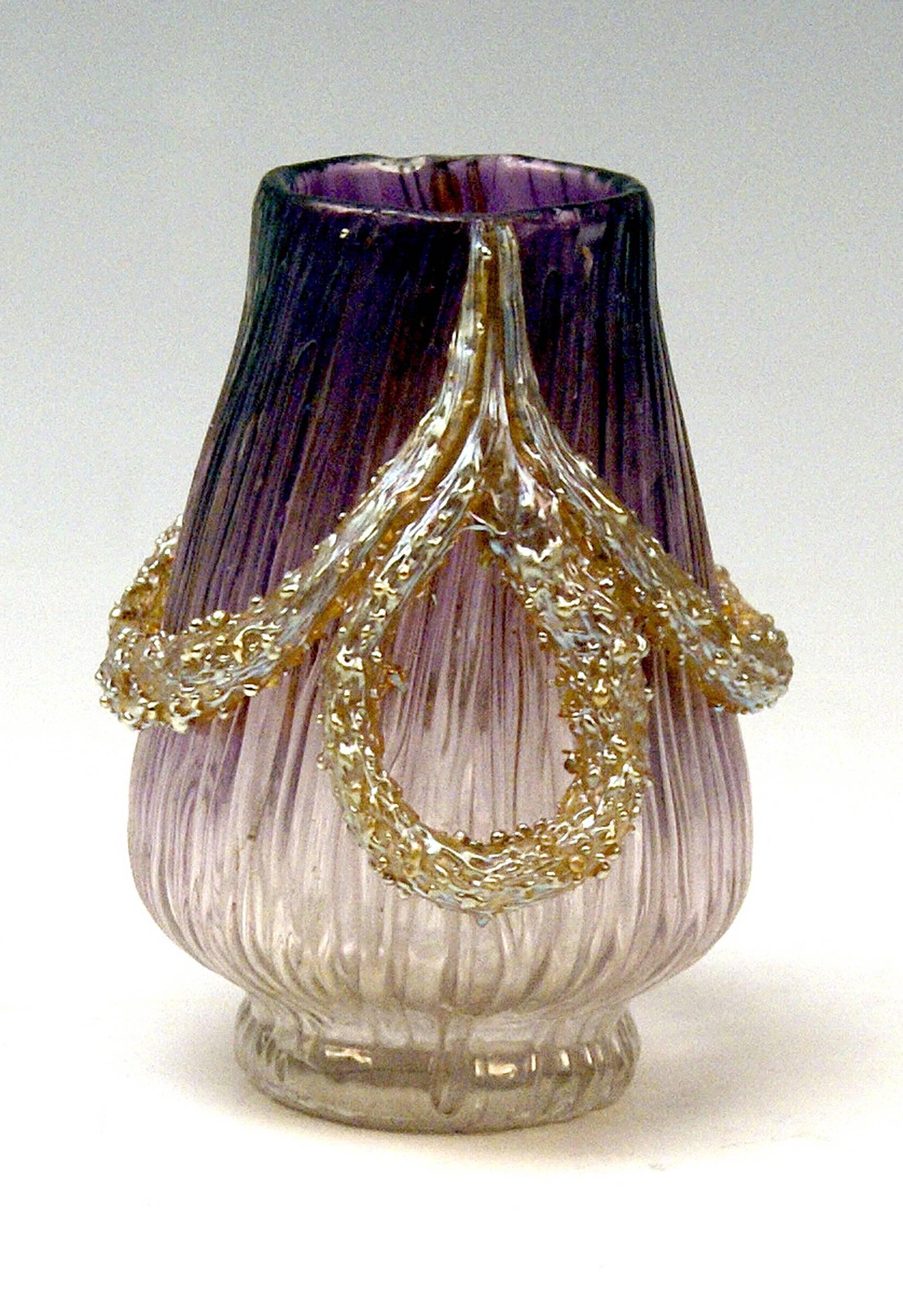 Made by Loetz, Klostermuehle (Bohemia / Old Imperial Austria) / circa 1900
Decor: Texas (= milky glass, merging into violet shades at top area). 

Detailed description:
Vase Loetz (Lötz) Widow Klostermuehle Bohemia Art Nouveau / decor texas: It