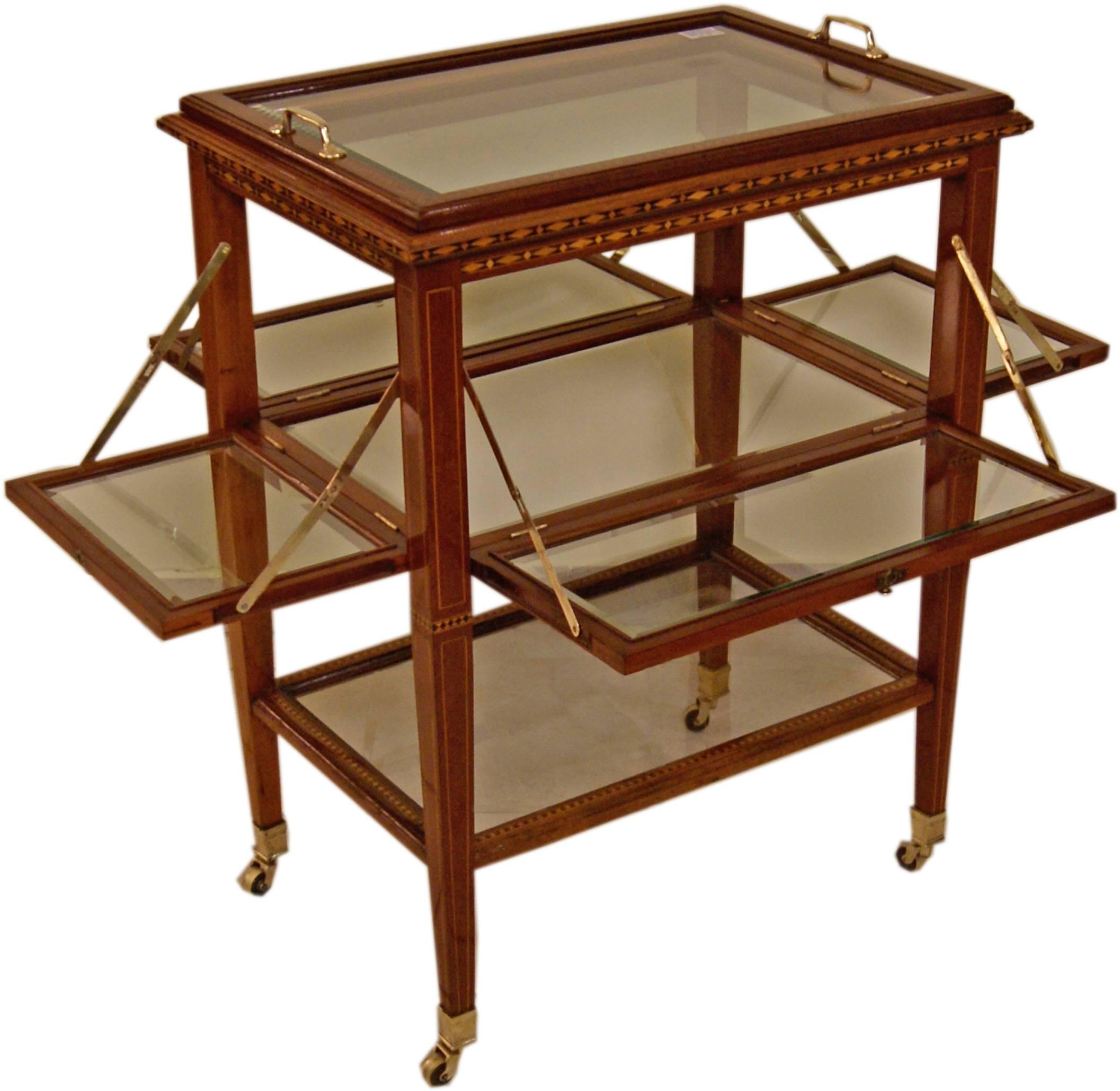 Most elegant Art Nouveau serving trolley or bar cart, Vienna, made circa 1900.
 
Serving trolley of finest manufacturing quality.
Mahogany massive and veneer or refurbished by hand.
Additionally, the bar cart's edges at top part are decorated