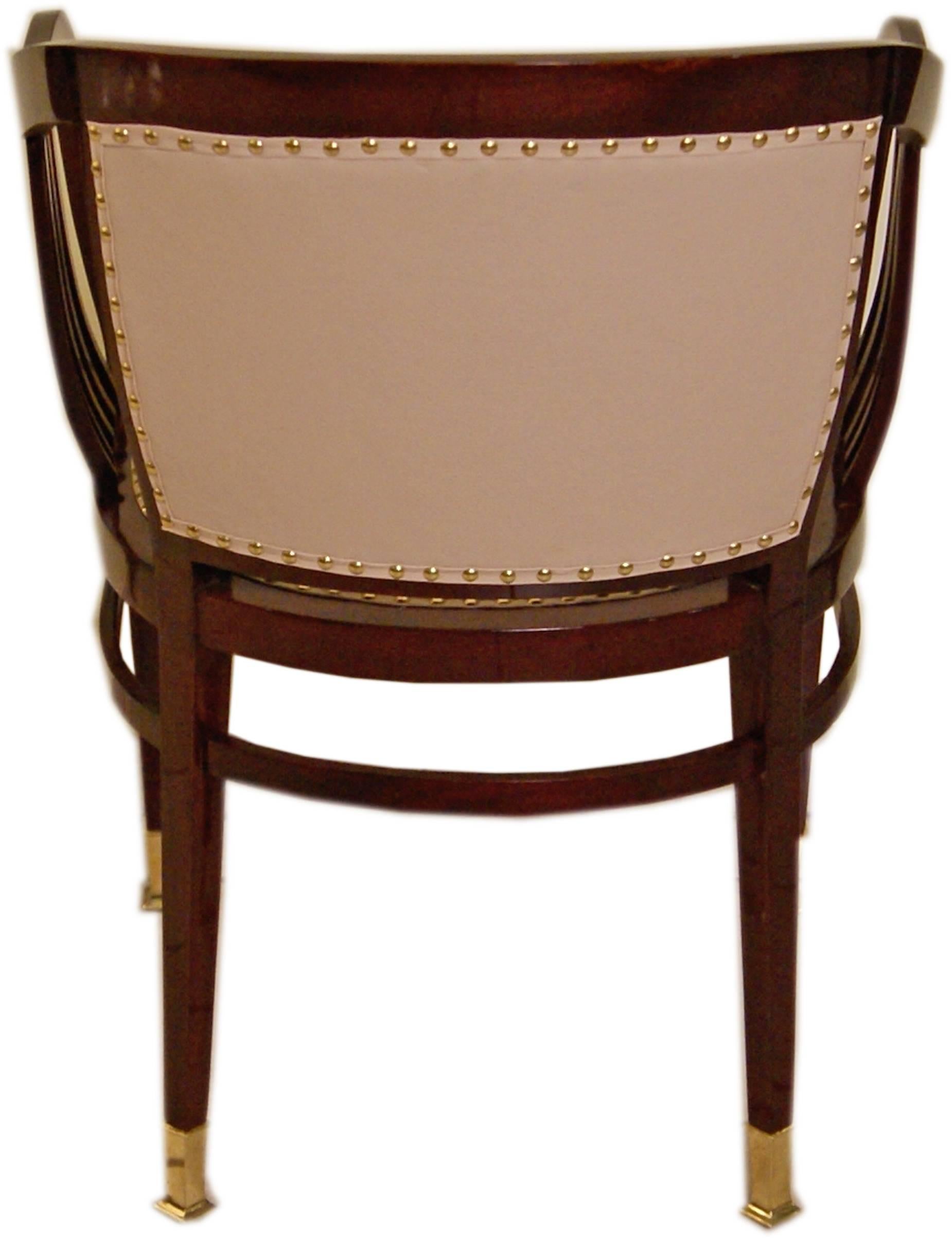 Art Nouveau most elegant armchair.

Finest manufacturing quality! 

Beechwood, mahogany stained, refurbished by hand

The seat as well as backrest are upholstered with elegant fawn (= beige-coloured) leather (restored). The armrests are