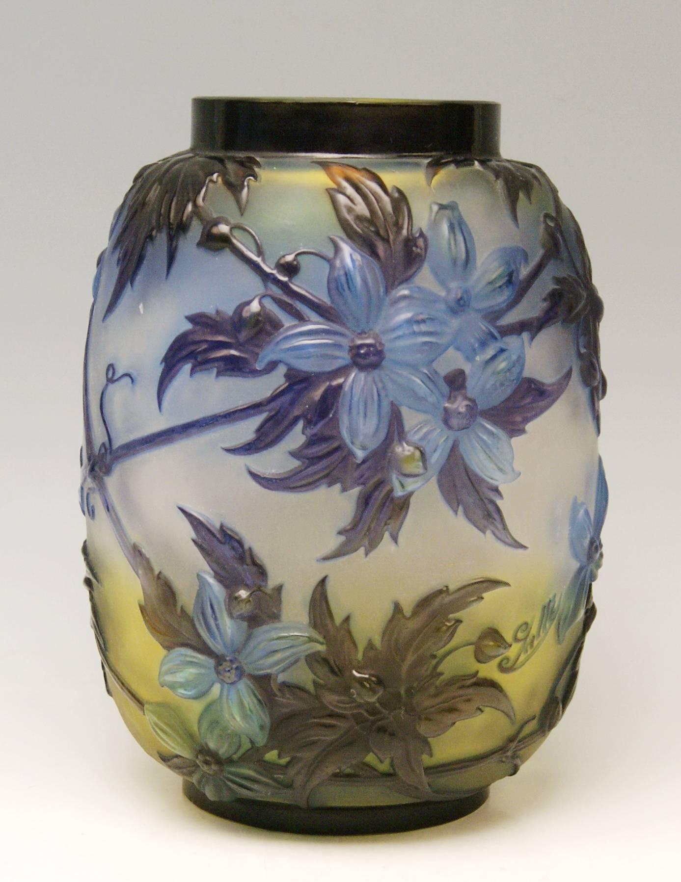 Gallé Nancy Art Nouveau bellied Soufflé Vase
made in France (Nancy, Lorraine) / circa 1925 

Specifications:
Stunningly manufactured casing glass (yellowish-opalescent underneath / bright blue & dark violet shaded at outer wall). - It is a bellied