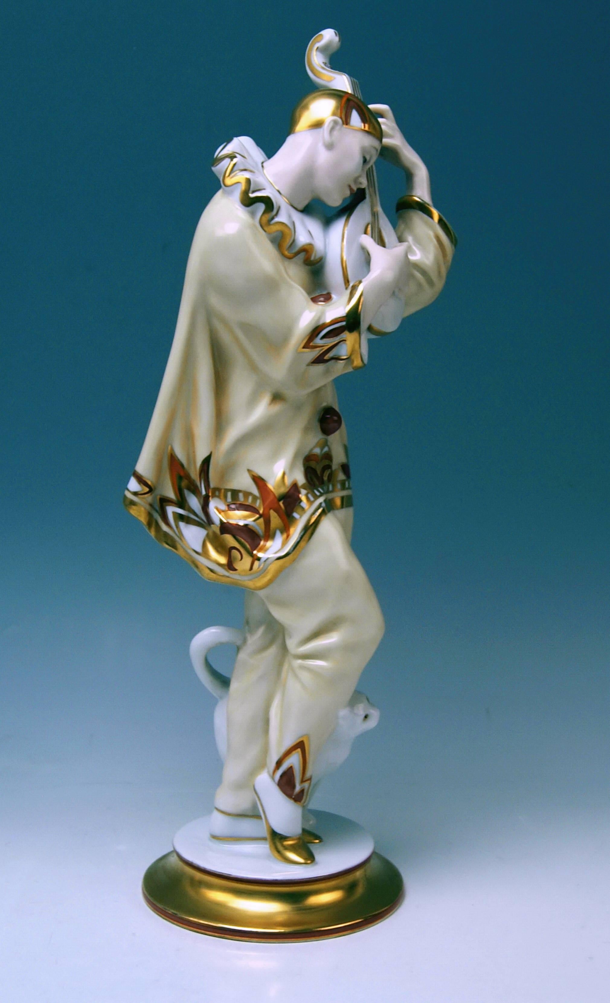 Rosenthal rarest Art Deco figurine of a Pierrot:
A gorgeous rarest figurine - called 'Ash Wednesday' wearing a Pierrot's costume (ruff, cap, a loose-fit shirt and trousers) plays the lute / a lovely cat nuzzles up against Pierrot's legs. The