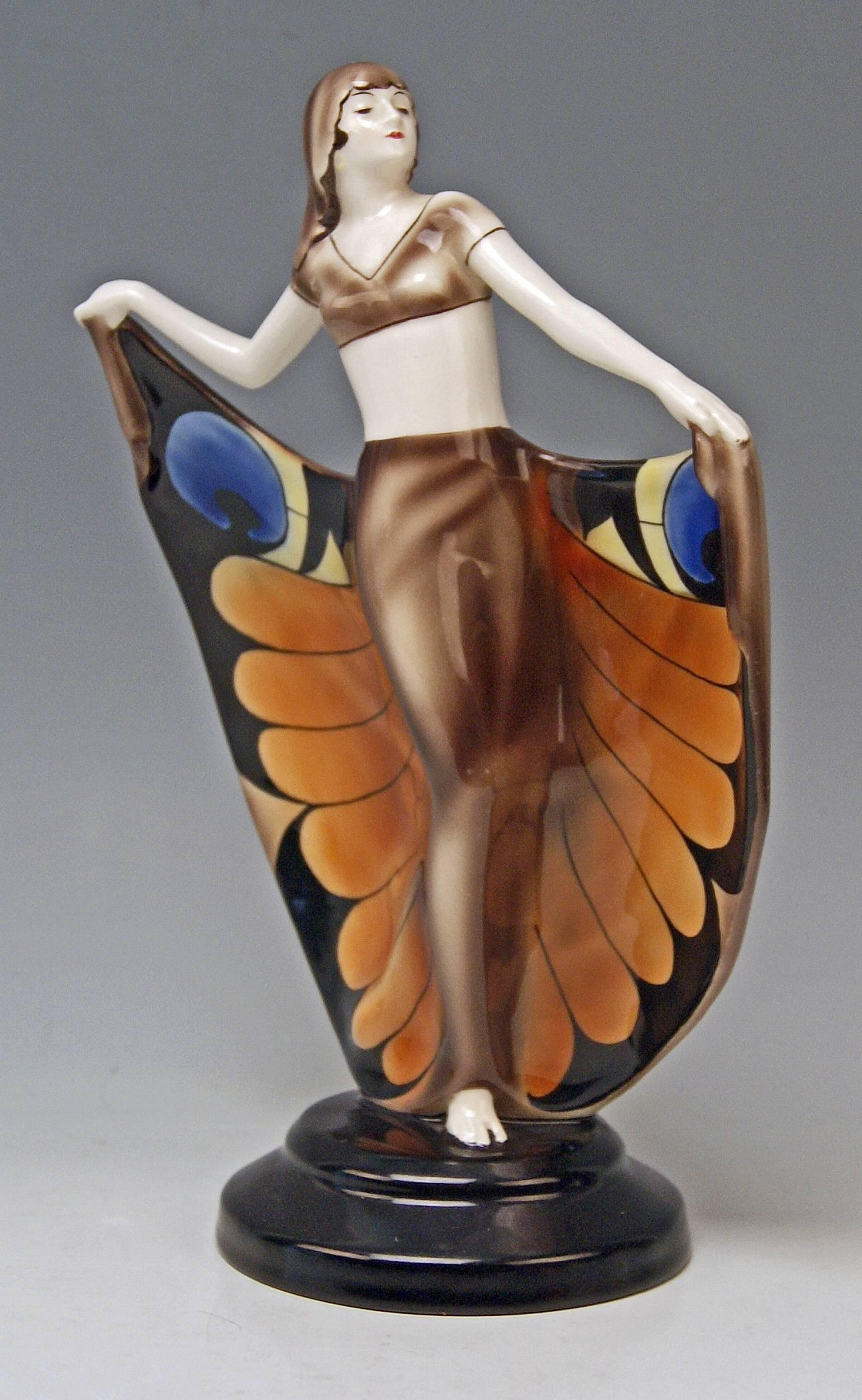 Goldscheider Vienna rarest oriental lady butterfly dancer wearing veil which covers woman's hair.

Designed by Josef Lorenzl (1892 - 1950) / one of most important designers having been active for Goldscheider manufactory in period of 1920-1940
