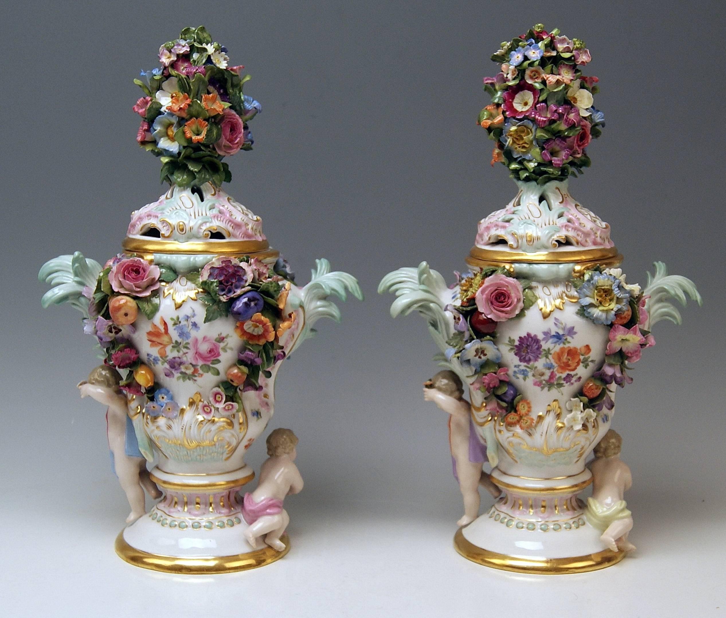 Meissen gorgeous quite rare items: a pair of potpourri lidded vases with abundant sculptured decorations as well as with nicest Watteau paintings.

Measures:
Total height: 35.0 cm (13.77 inches) lid included.
Total width: 22.0 cm ( 8.66