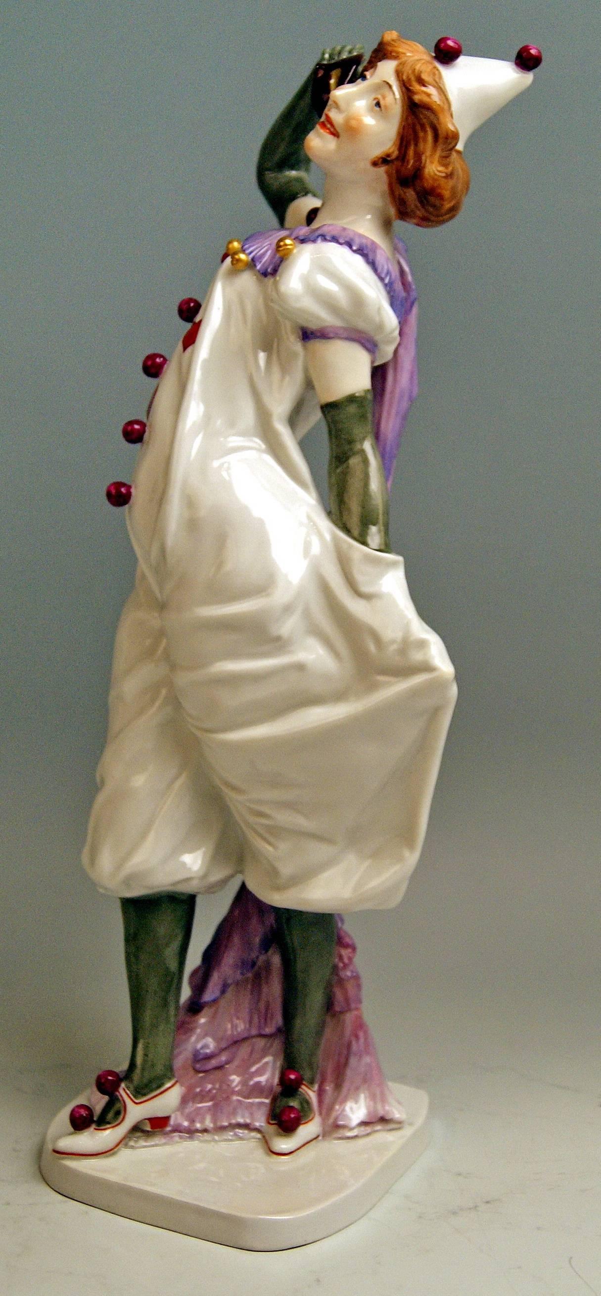 Meissen most remarkable figurine: Pierrette (=Female Pierrot)

Measures / dimensions:
height: 13.58 inches / 34.5 cm 
width: 4.33 inches / 11.0 cm
depth: 4.13 inches / 10.5 cm

Manufactory: Meissen
Hallmarked: Blue Meissen sword mark (glazed