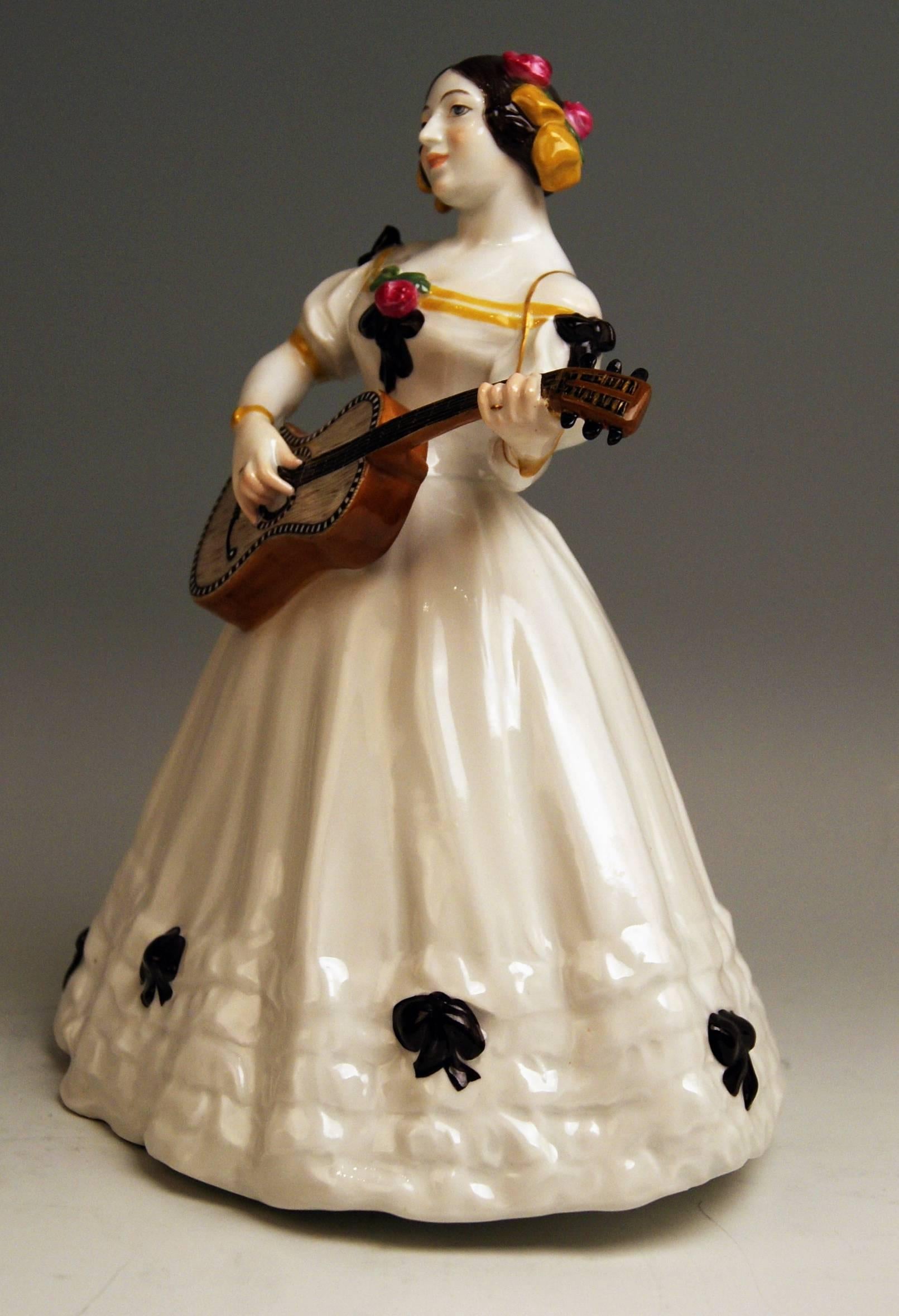 Meissen rarest figurine: female lute player (= Kate Hyan)

Measures / dimensions:
height: 10.23 inches 
width: 8.26 inches
depth: 6.10 inches 

Manufactory: Meissen
Hallmarked: Blue Meissen Sword Mark (glazed bottom)
model number V 143 /
