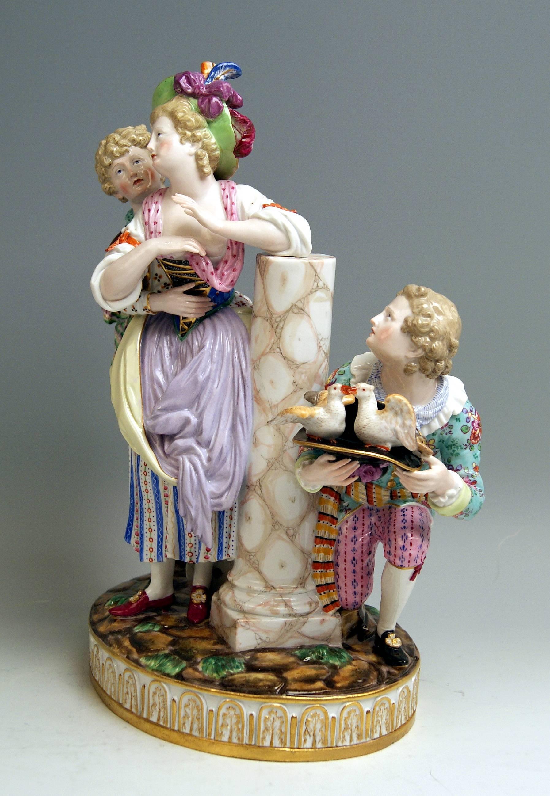 Meissen most lovely figurine group: The Approach (=loving couple with scout and pigeons)

Measures / dimensions:
height 12.79 inches / 32.5 cm 
width 9.44 inches / 24.0 cm
depth 5.70 inches / 14.5 cm

Manufactory: Meissen
Hallmarked: Blue