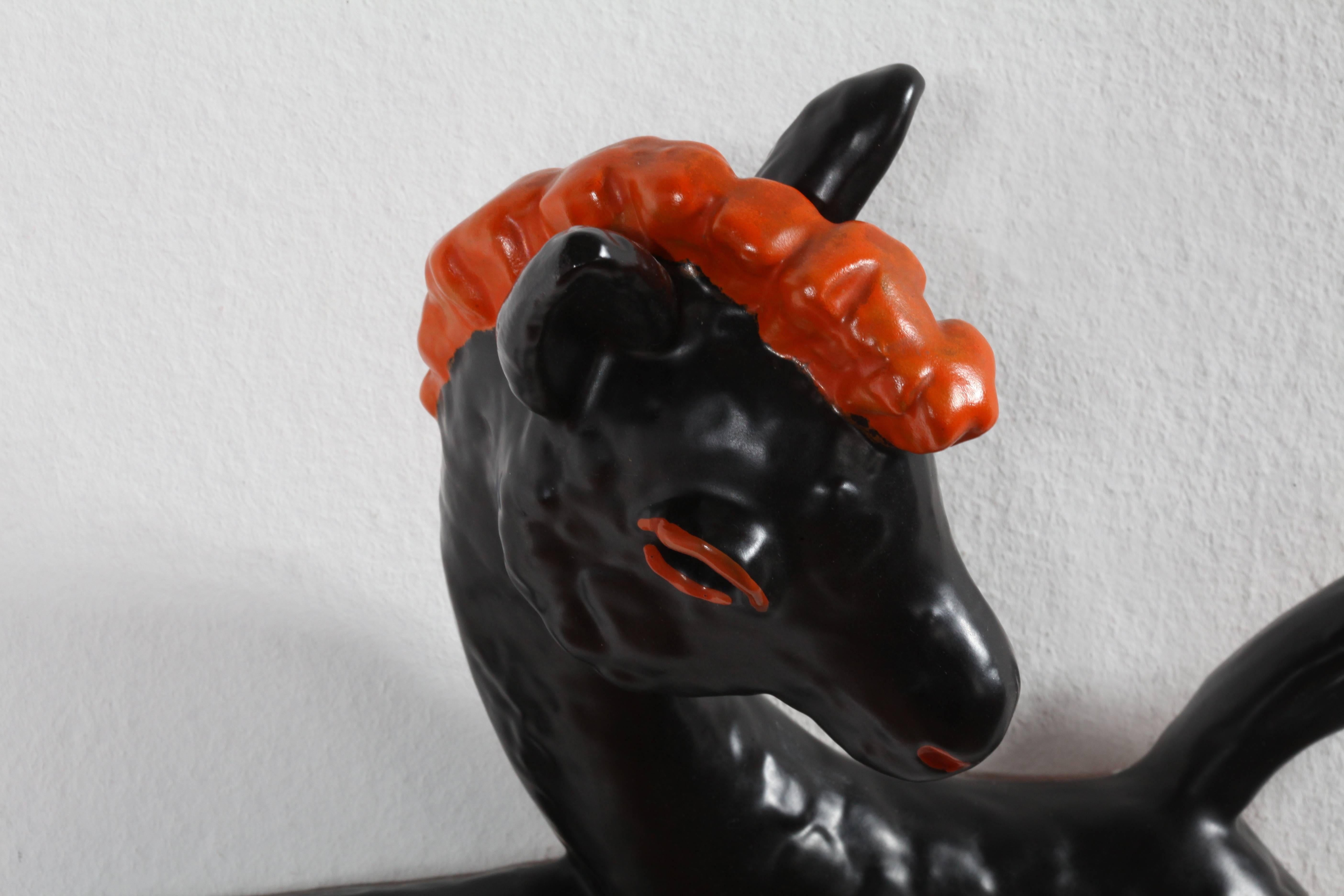 Ceramic horse.
Manufacturer- Goldscheider.
Germany, 1950.
Two color.
Measures: Width 14 inch (34cm).
Height 11 inch (28cm).
Depth 5 inch (12cm).