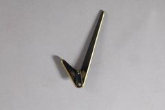 Seven Big and Five Small Asymmetric Modernist Brass Wall Hooks by Hertha Baller