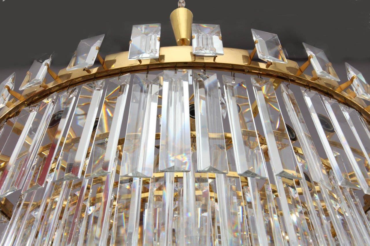 This crystal glass chandelier was designed by Oswald Haerdtl for the 
