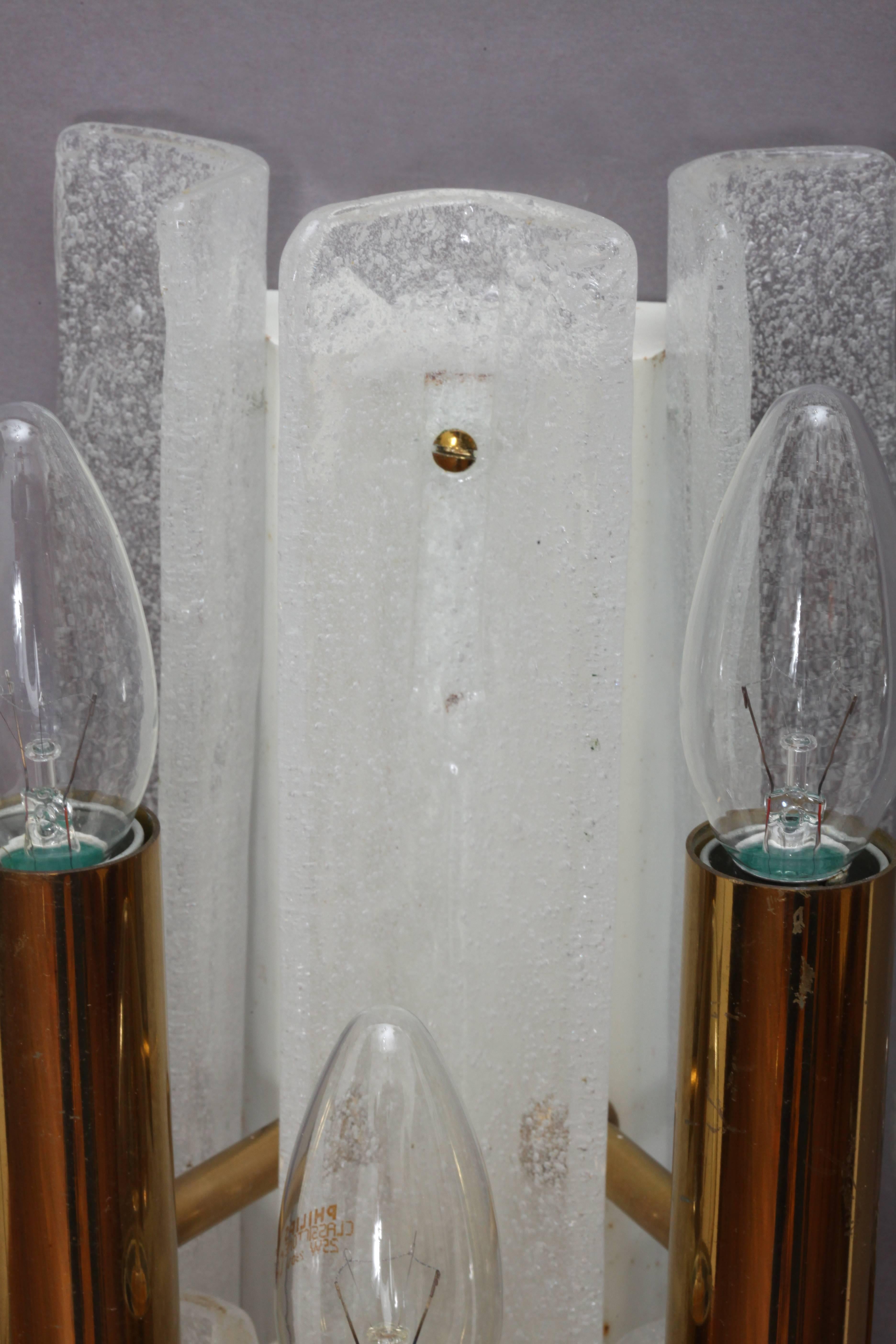 A pair of huge ice glass sconces,
J. T. Kalmar,
Austria, 1950.
Opal foam glass,
Four bulb sockets E14 60 each Watt.
