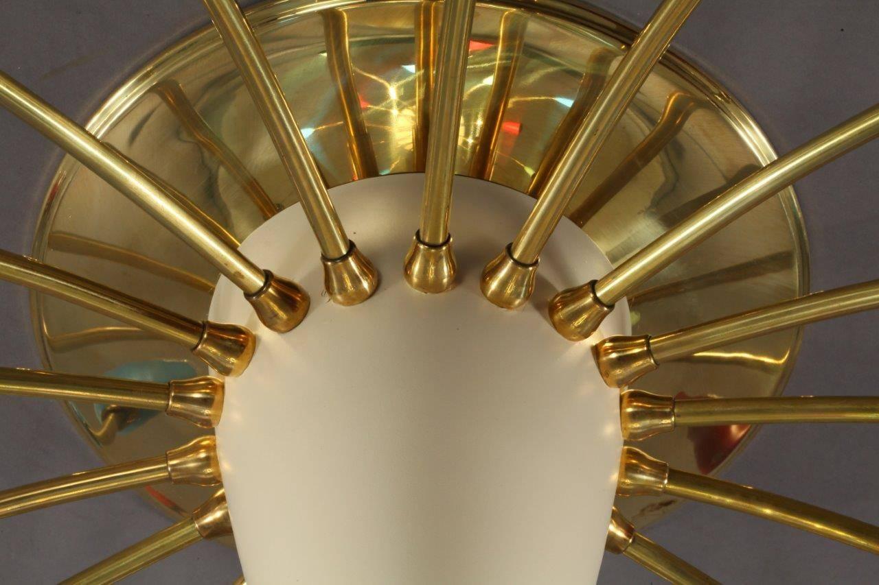 Ceiling flush mount,
Italian, 1950.
18 brass arms with colorful cones.
18 bulb sockets E27 40 watt.