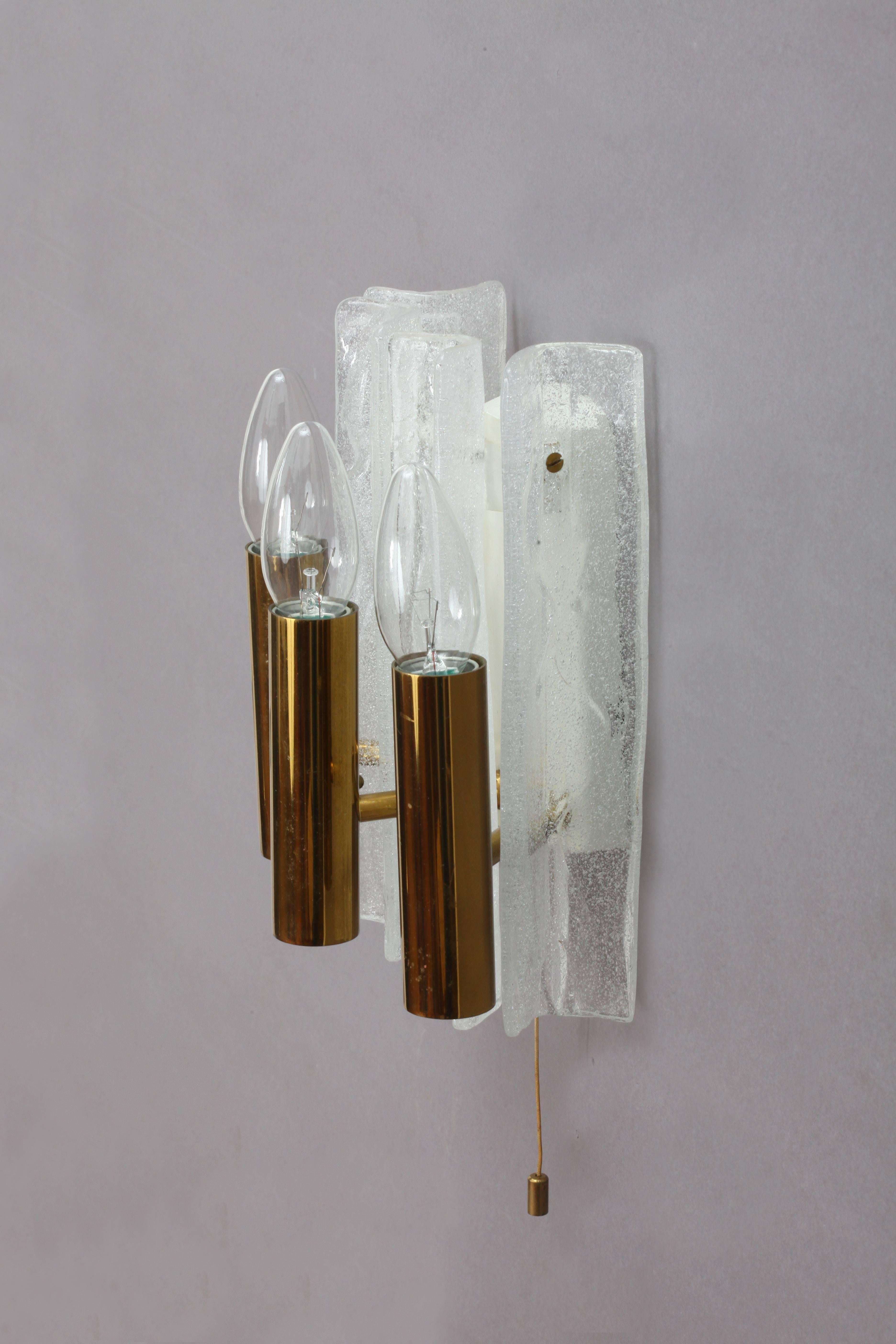 A pair of ice glass sconces,
J. T. Kalmar,
Austria 1950.
Opal foam glass,
three bulb sockets E14 60 each watt.