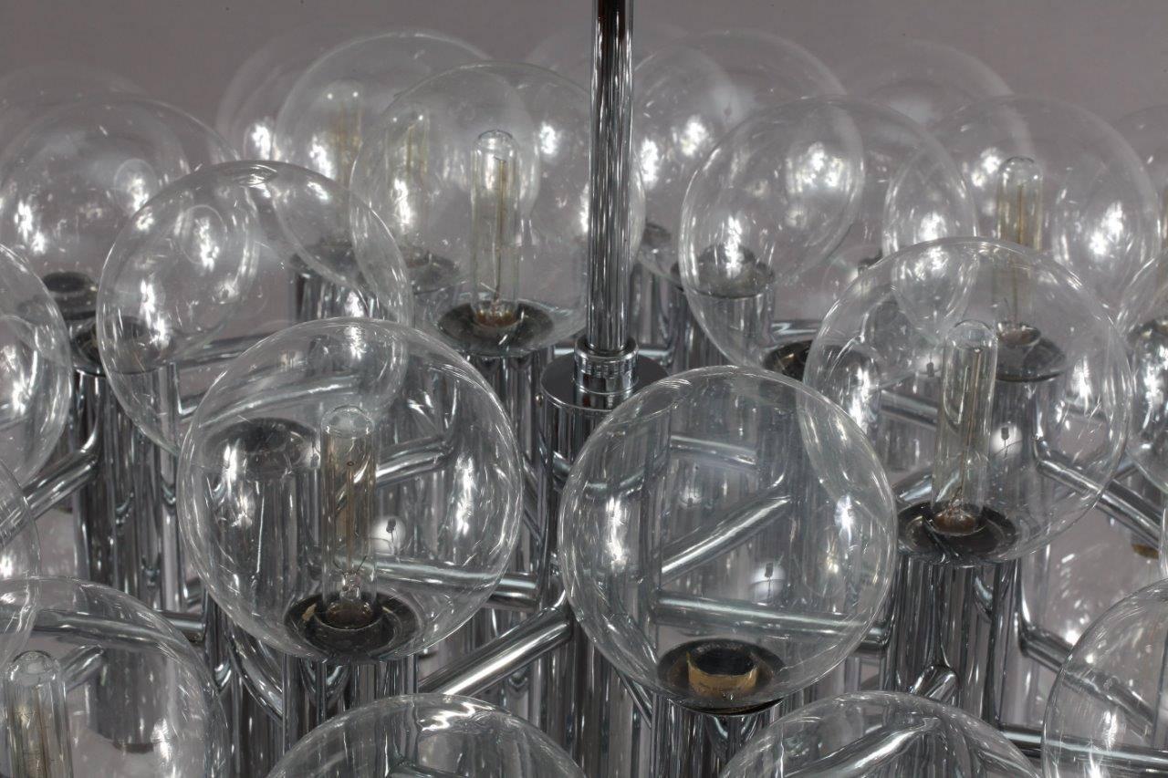 Hanging lamp,
Motoko Ishii (Japan) for Staff (Germany) 1971.
Chrome, 72 glassballs (diameter 5 inch),
72 E 14 bulb sockets.