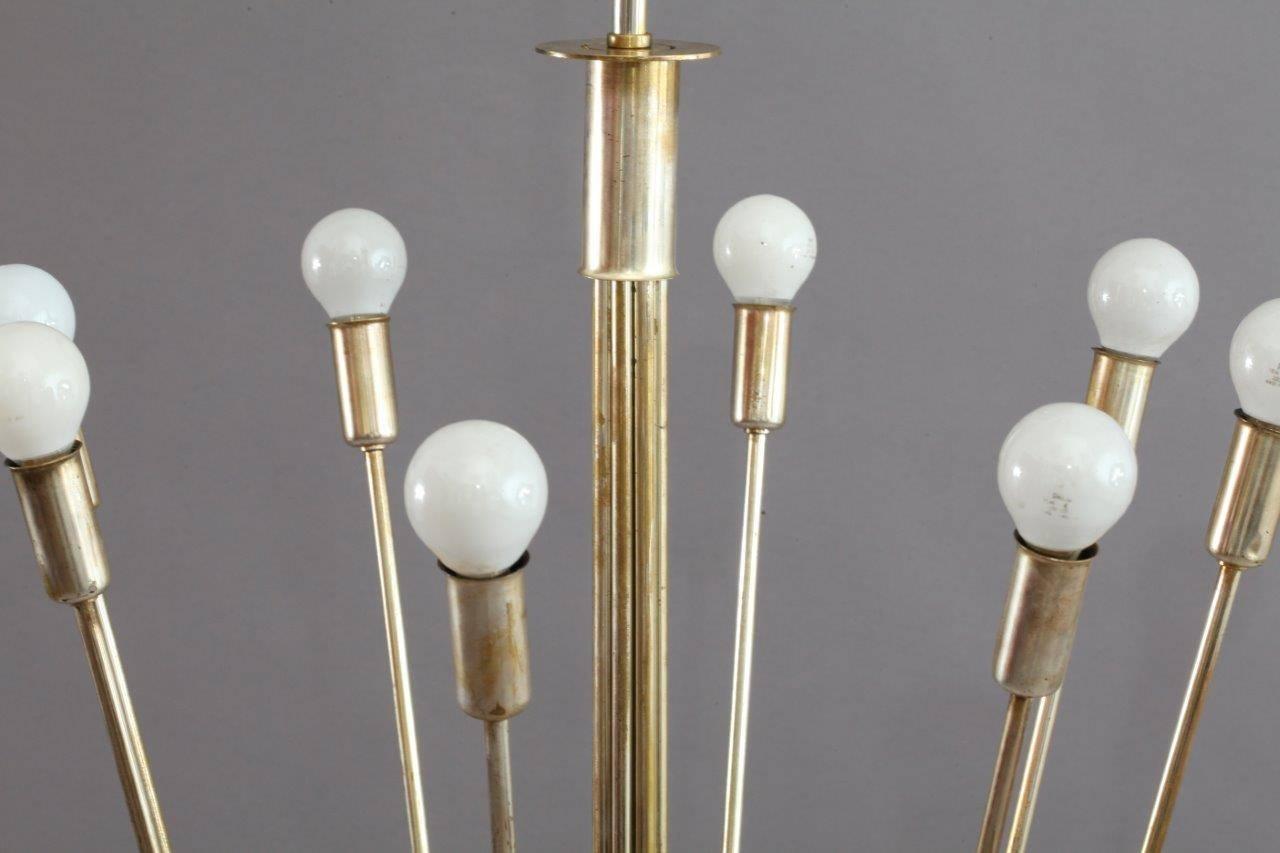 Italian chandelier,
Italy, 1950.
Silver plated,
Eight arms, eight E 14 bulb sockets max. 60 watt each.
 