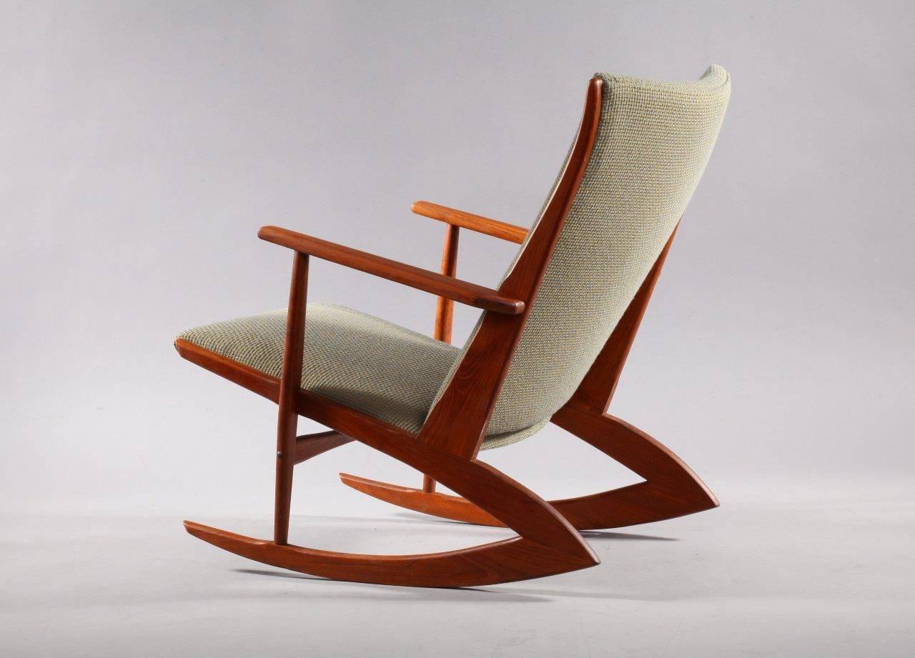 
With it's grasshopper like form, Holger Georg Jensen's, 1958 design is an interesting approach to the rocking chair. Another novel design element, in much like a sailboat, this chair has ballast under the front seat to create balance in response