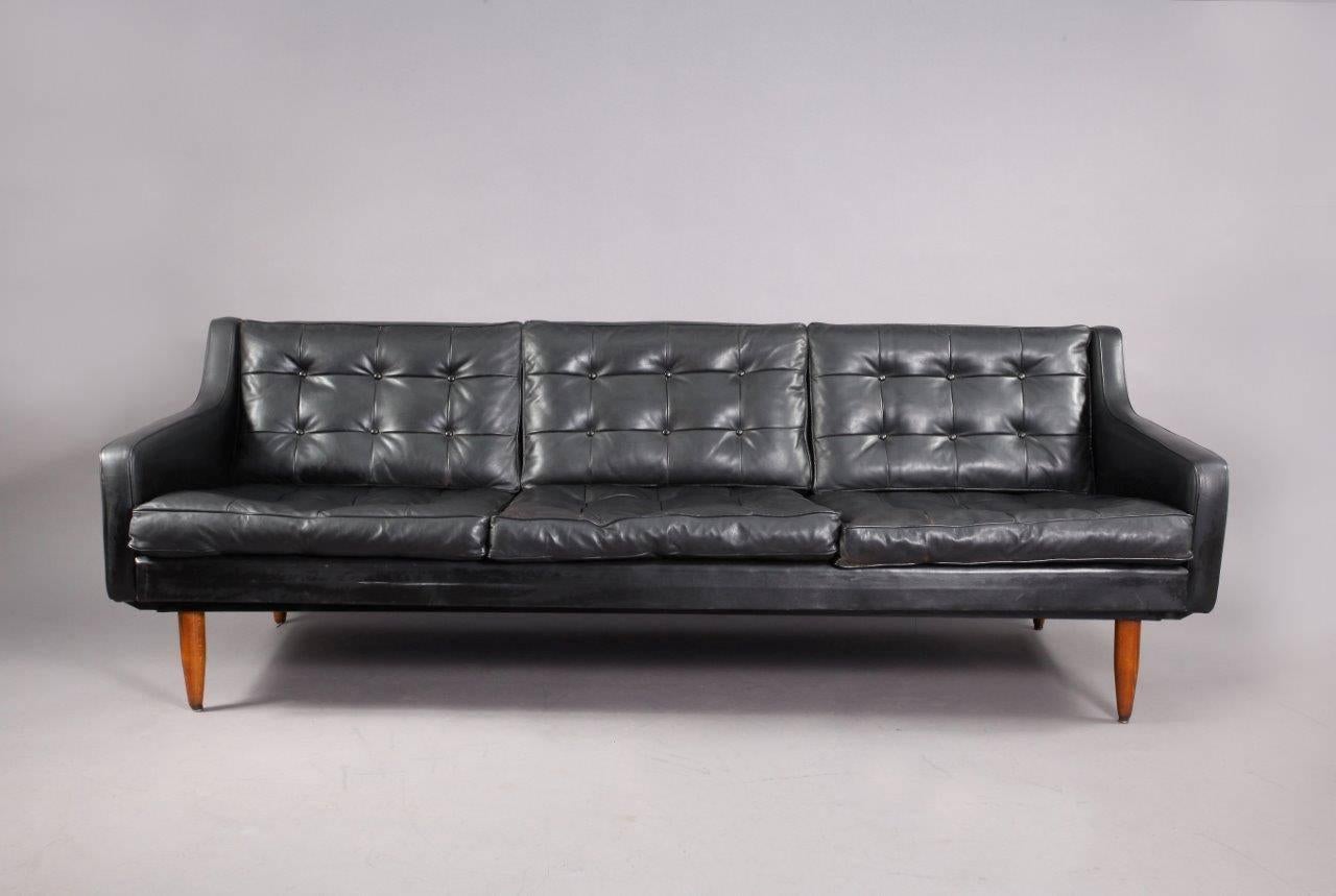 Living room set,
daybed and two armchairs,
Wittmann, Austria,
Vienna, 1950.
Black leather and teakwood round legs.
Measurement:
Sofa: 78 inch W, 31 inch D, 27 inch H,
fauteuil: 27 inch W, 31 inch D, 27 inch H.
   