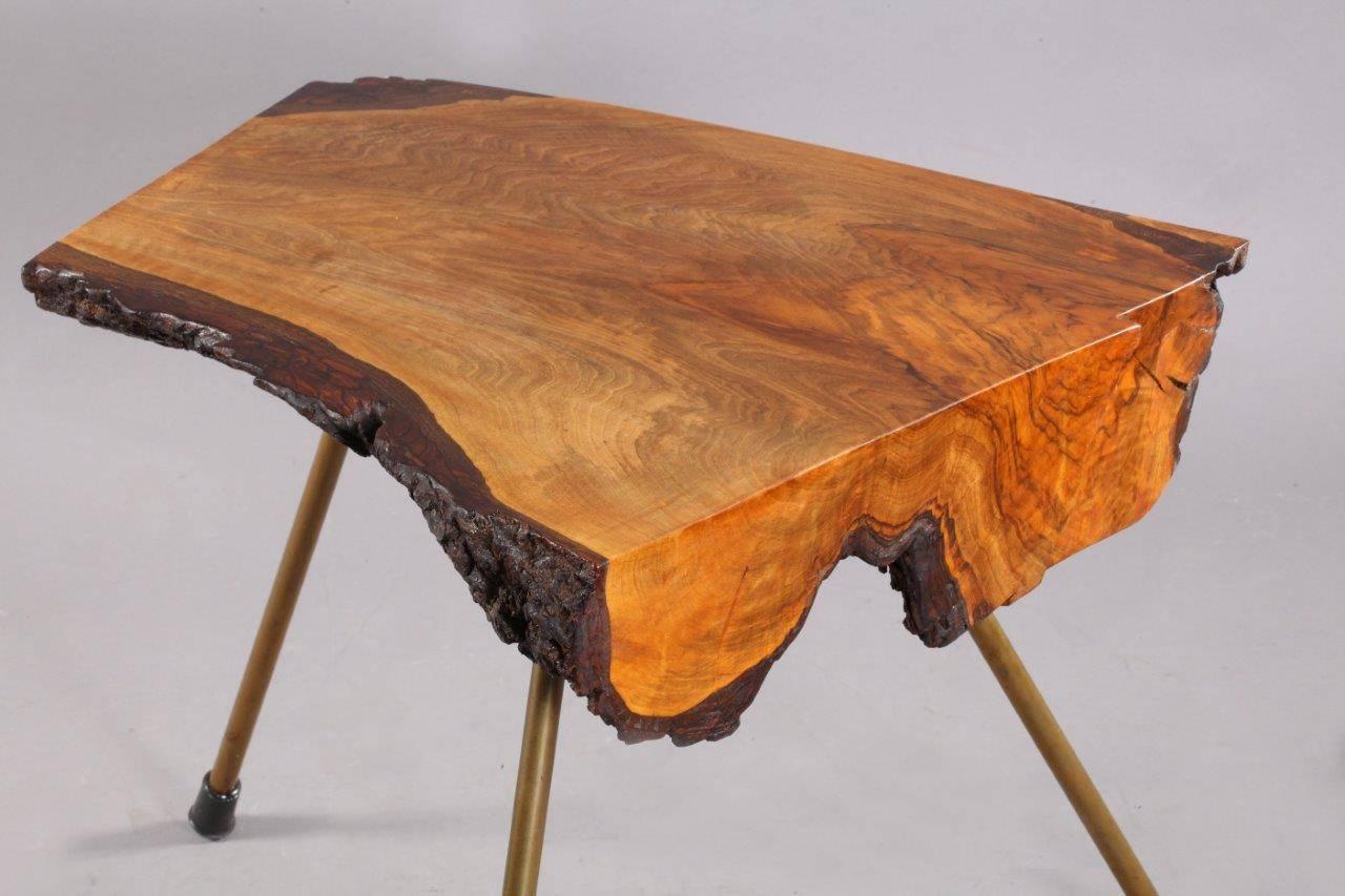 Treetrunk table
Designed and manufactured by Carl Auböck
Vienna, 1950
Solid walnut, brass legs,
rubber shoes.
 