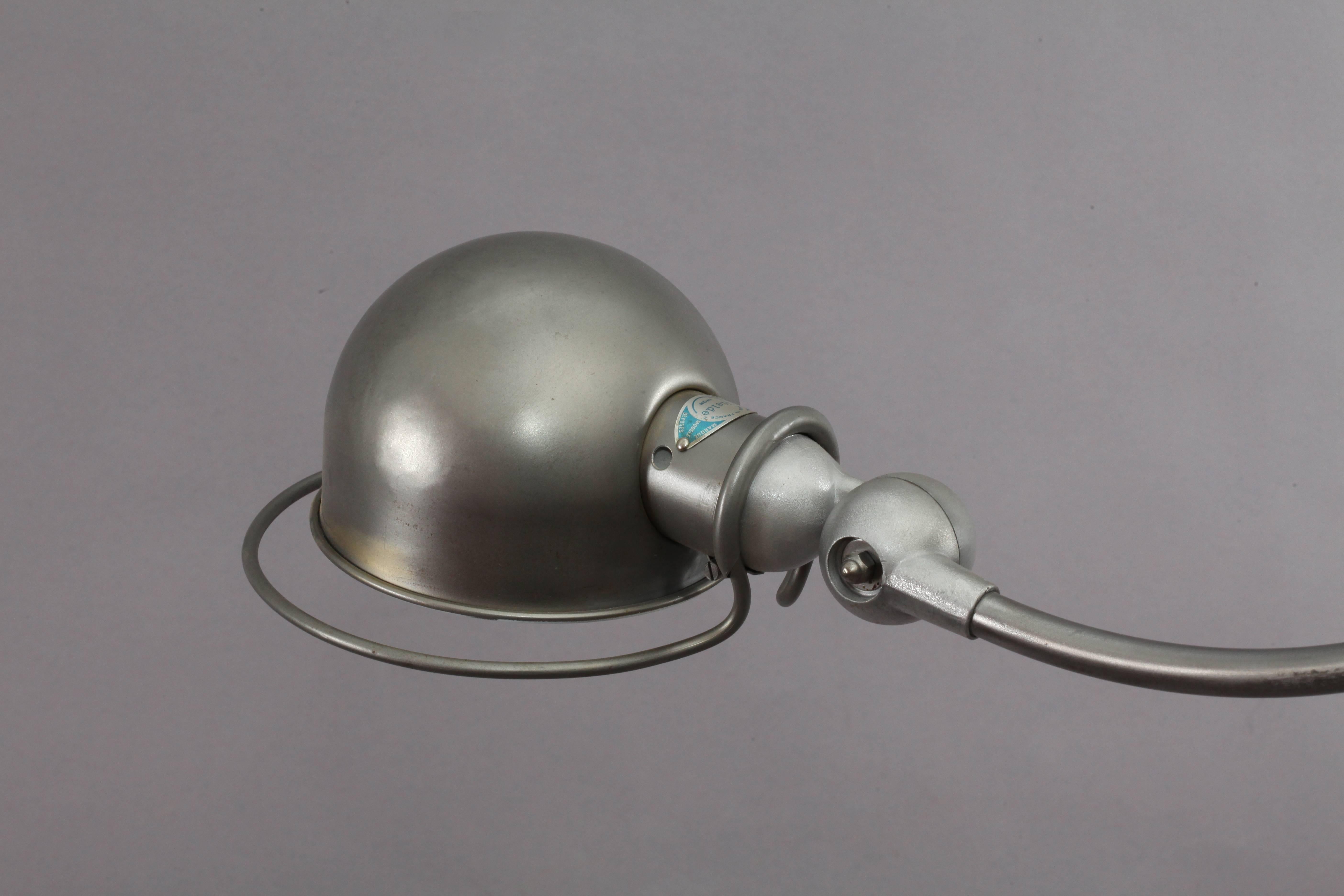 Industrial design,
Factory ceiling flush mount
designed Jean Louis Domecq,
manufacture Jielde Lyon.
France, 1950.
Three adjustable arms and shades,
measures: height adjustable 20-60cm
polished steel.