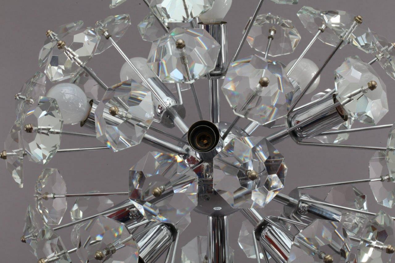 Chrome floor lamp,
model snowflake
manufacture Kinkeldey,
Germany, 1970.
Chrome base, many handcated glass parts.
Nine bulb sockets.