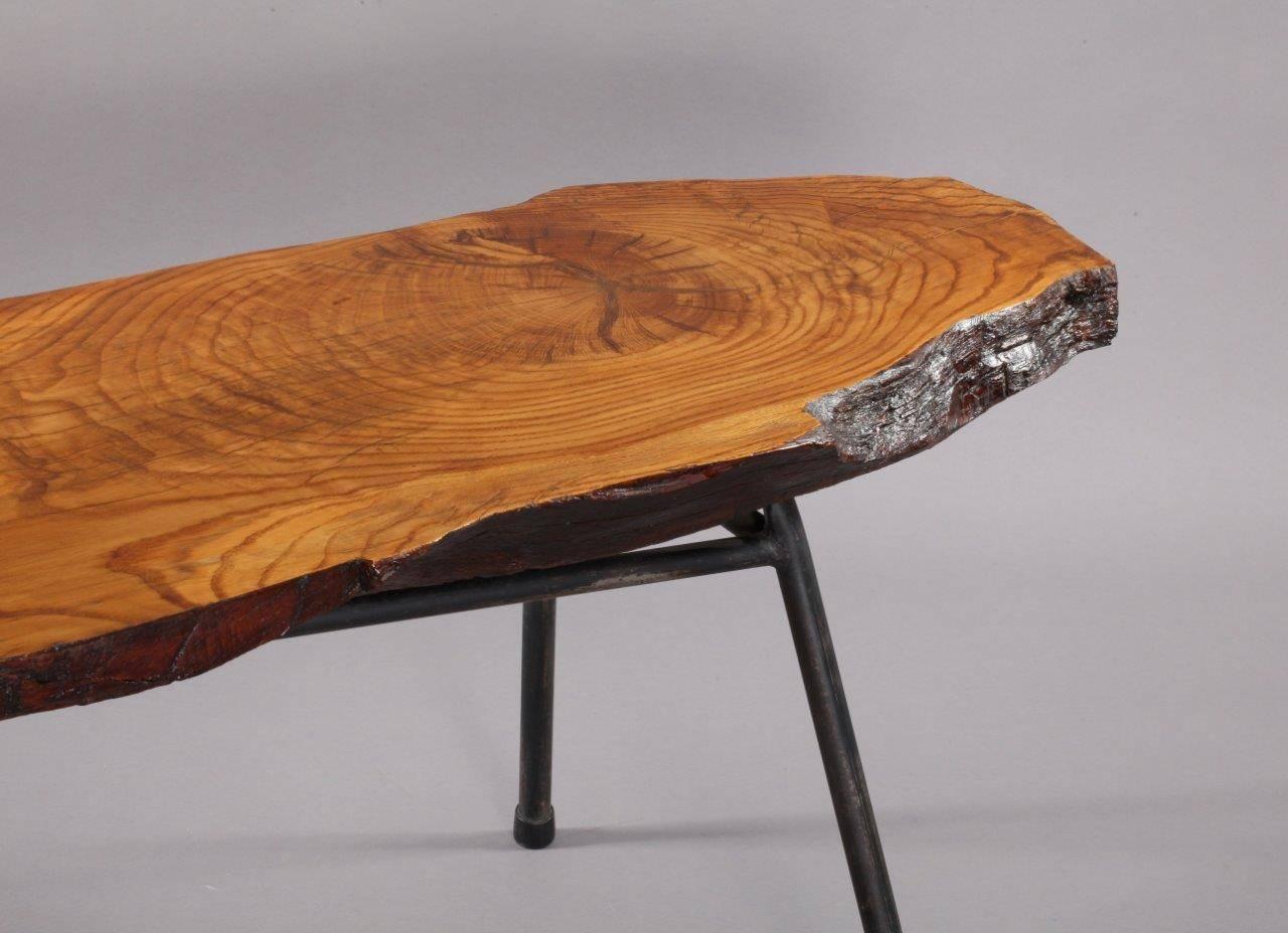 Treetrunk table
Vienna, 1950
Solid wooden plate,
Black laquered iron legs,
Rubber shoes.