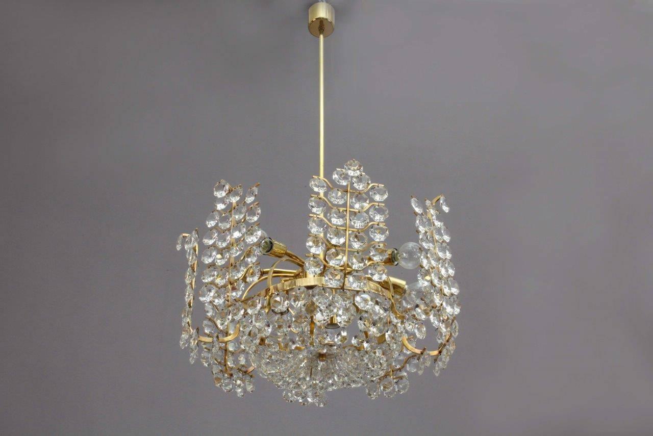 Crystal glass chandelier,
Bakalowits und Söhne,
Vienna, 1960.
Brass, crystal glass.
12 bulb sockets.
The length of the stem can be altered to any size for free
 