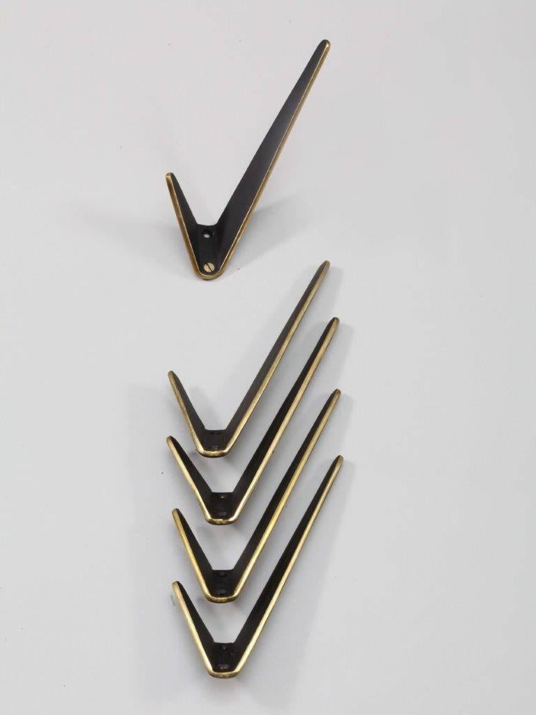 Five asymmetric modernist brass wall hooks by Hertha Baller,
Vienna, 1950.