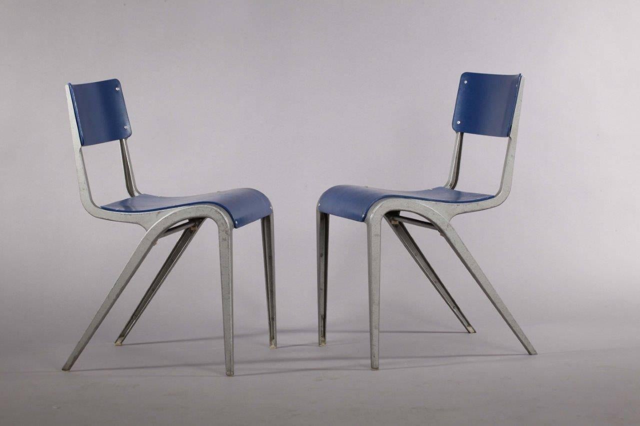 Pair of Industrial cast aluminium chairs designed James Leonard,
great Britain 1948.
Cast aluminium,
blue lacquered plywood seat.
