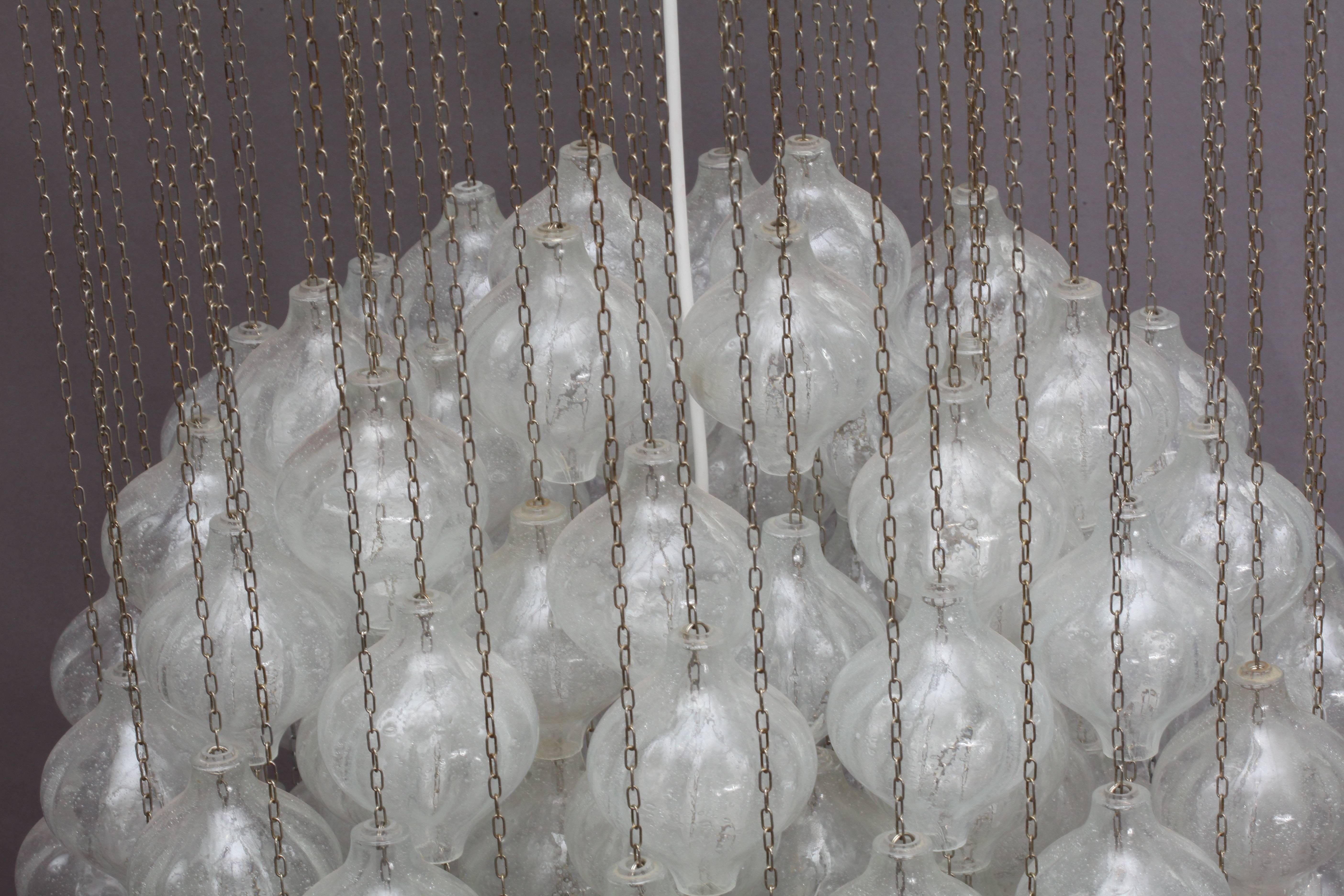 Huge rare 'Tulipan' glass pendant chandeliers by J.T. Kalmar, Austria, Vienna, manufactured in midcentury, circa 1970 (late 1960s or early 1970s). The name Tulipan derives from the tulip shaped hand blown bubble glasses. Each glass is handmade and