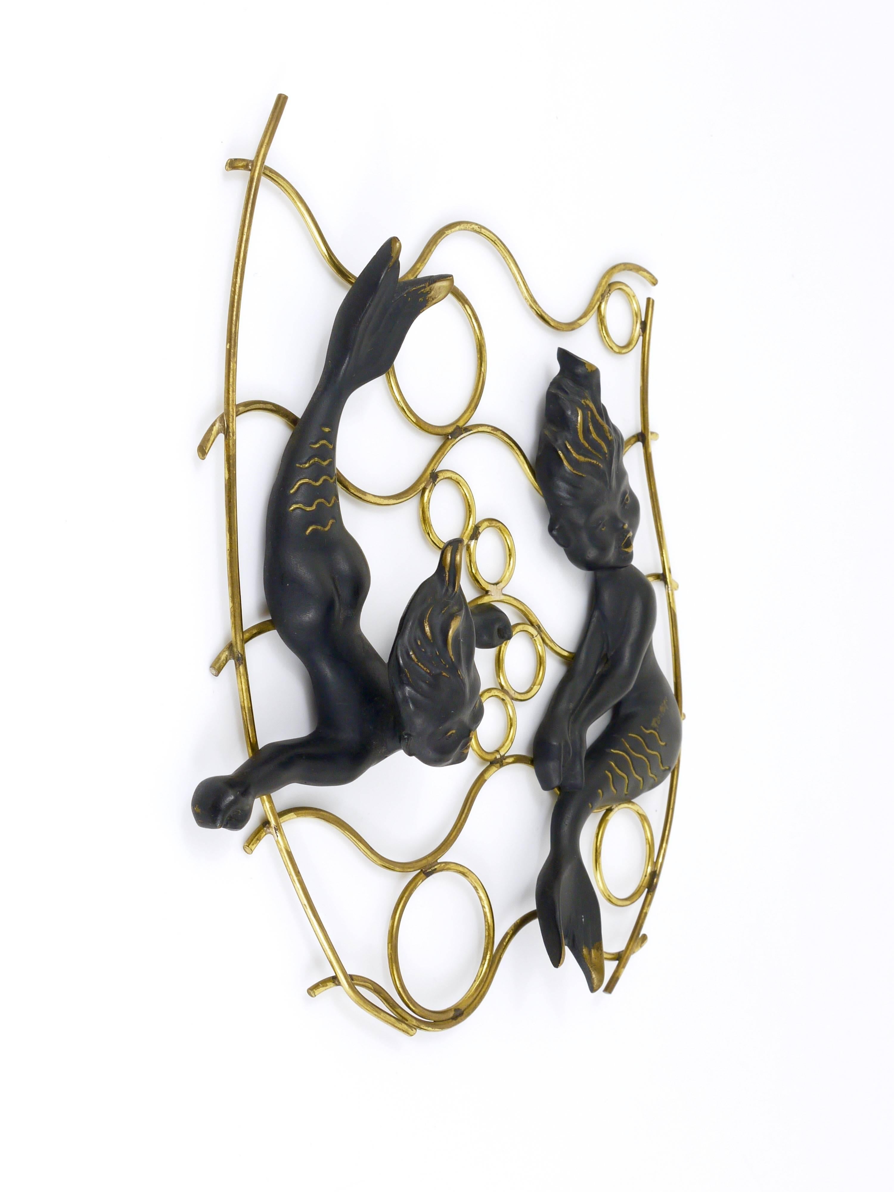 Two lovely mermaid sculptures, made of black-finished brass on a brass frame, manufactured in the 1950s by Hertha Baller, Austria. Very good condition.