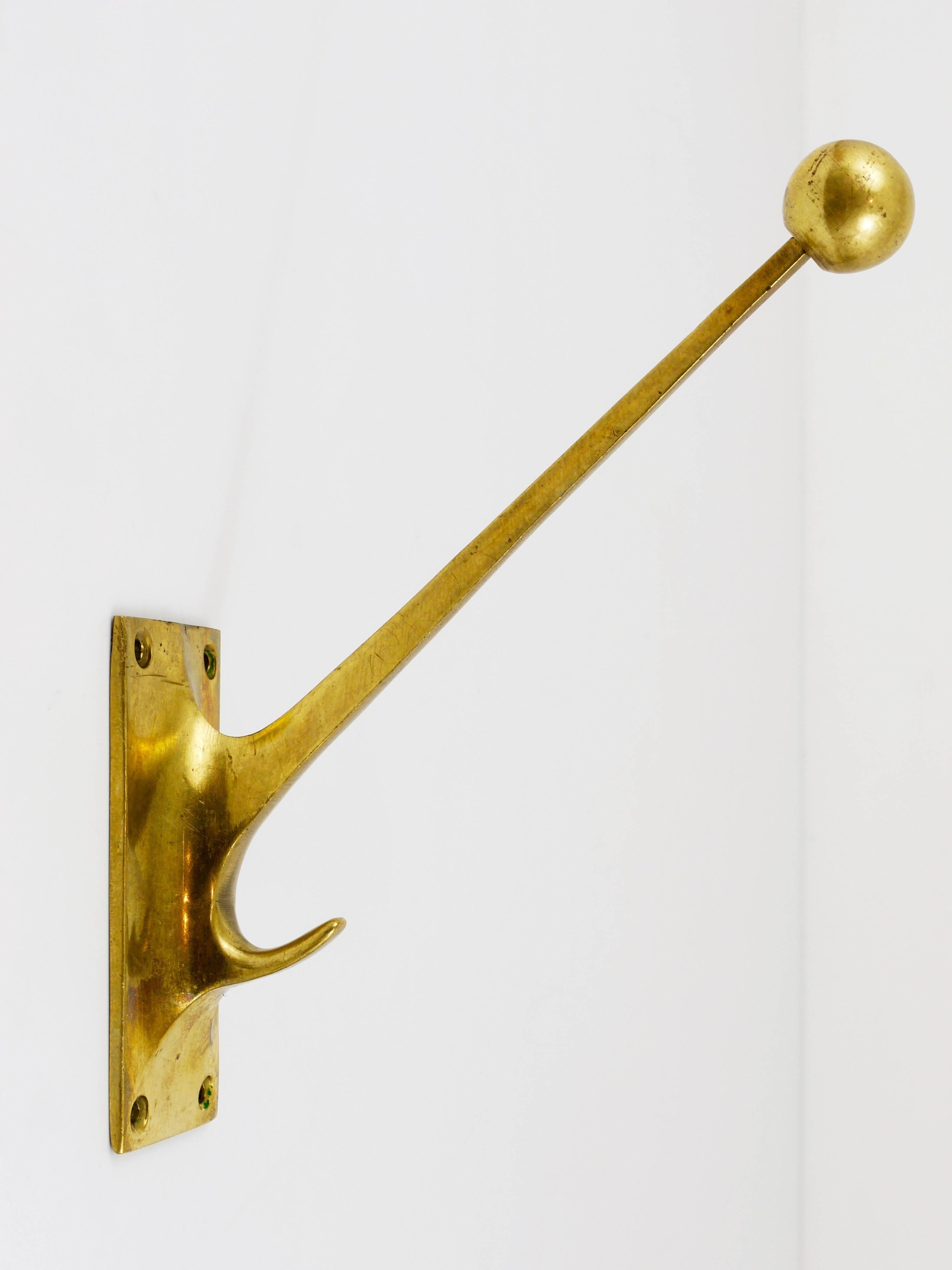 Up to six beautiful Art Nouveau brass coat hooks, designed in 1909 by Adolf Loos for the Viennese Tailor Knize & Comp. In good condition with nice patina. Sold and priced per piece.
 