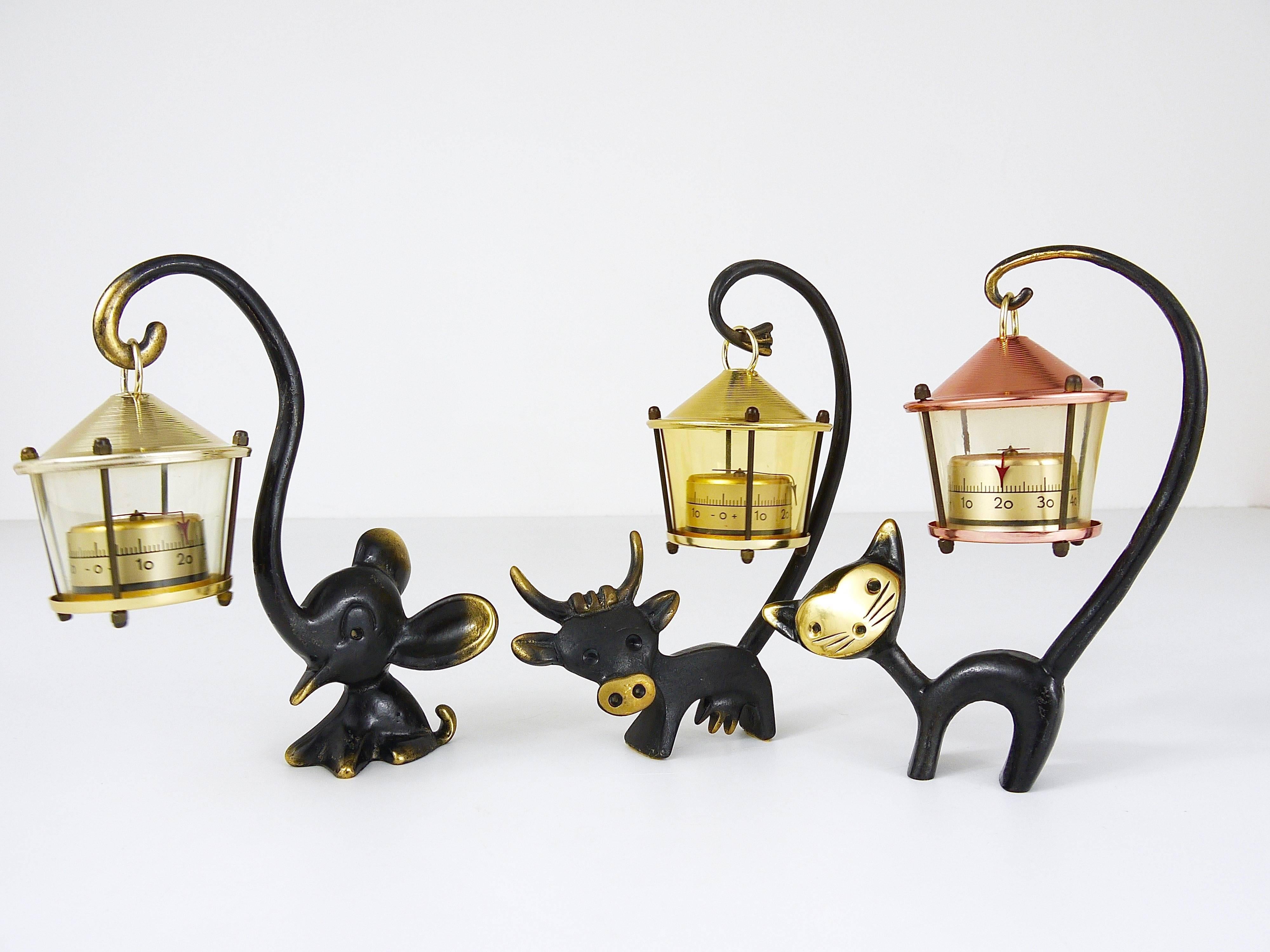 A very charming Austrian Mid-Century desk thermometer, consisting of a nice cat figurine and a lantern-shaped thermometer. A very humorous design by Walter Bosse, executed by Hertha Baller Austria in the 1950s. Made of brass, in very good condition,