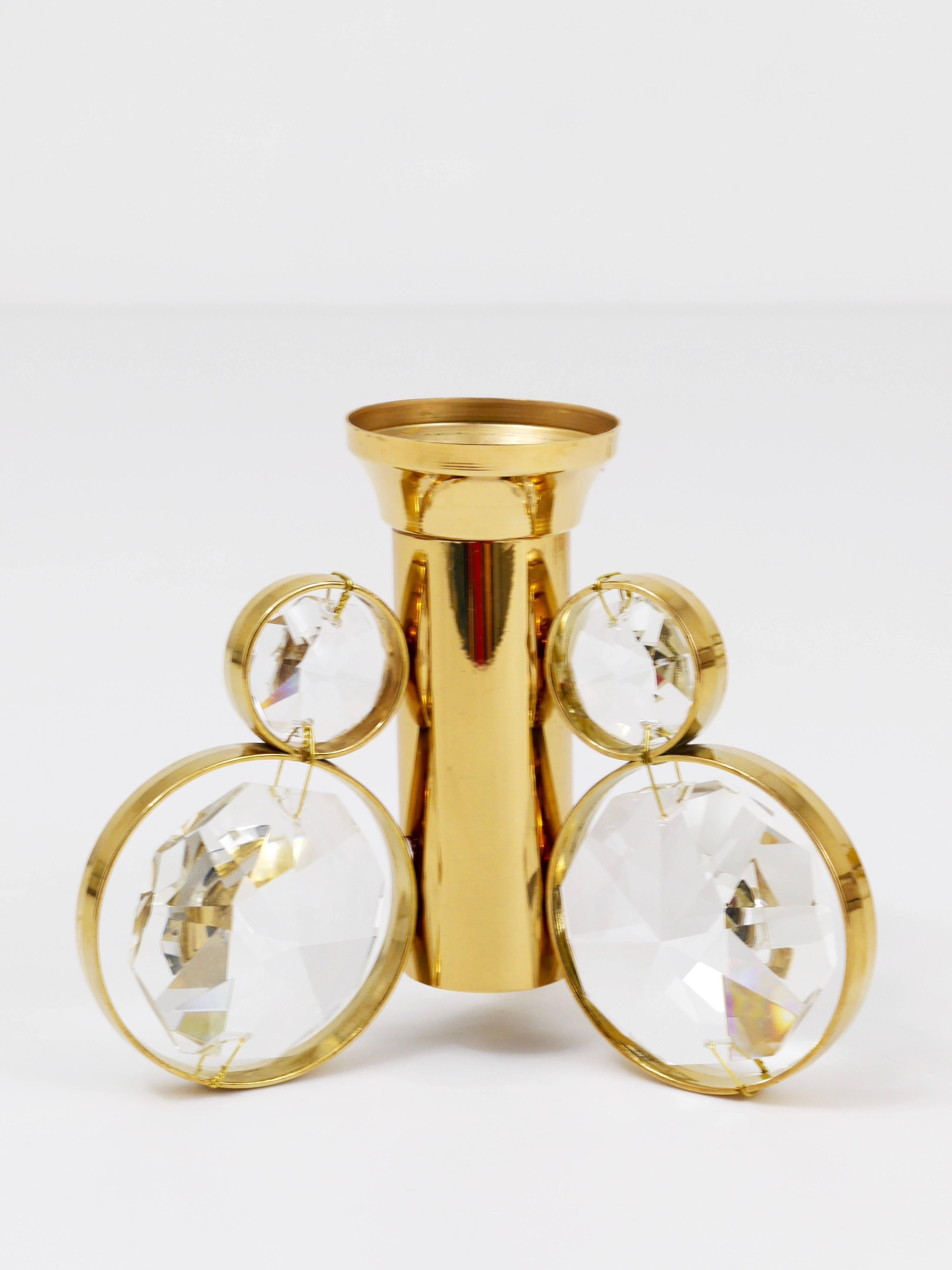Up to 10 beautiful candle holders in the style of Gaetano Sciolari. Manufactured in the 1970s by Palwa Germany. Made of gold-plated brass with huge faceted crystals. In excellent condition. There are ten identical candleholders available, the price