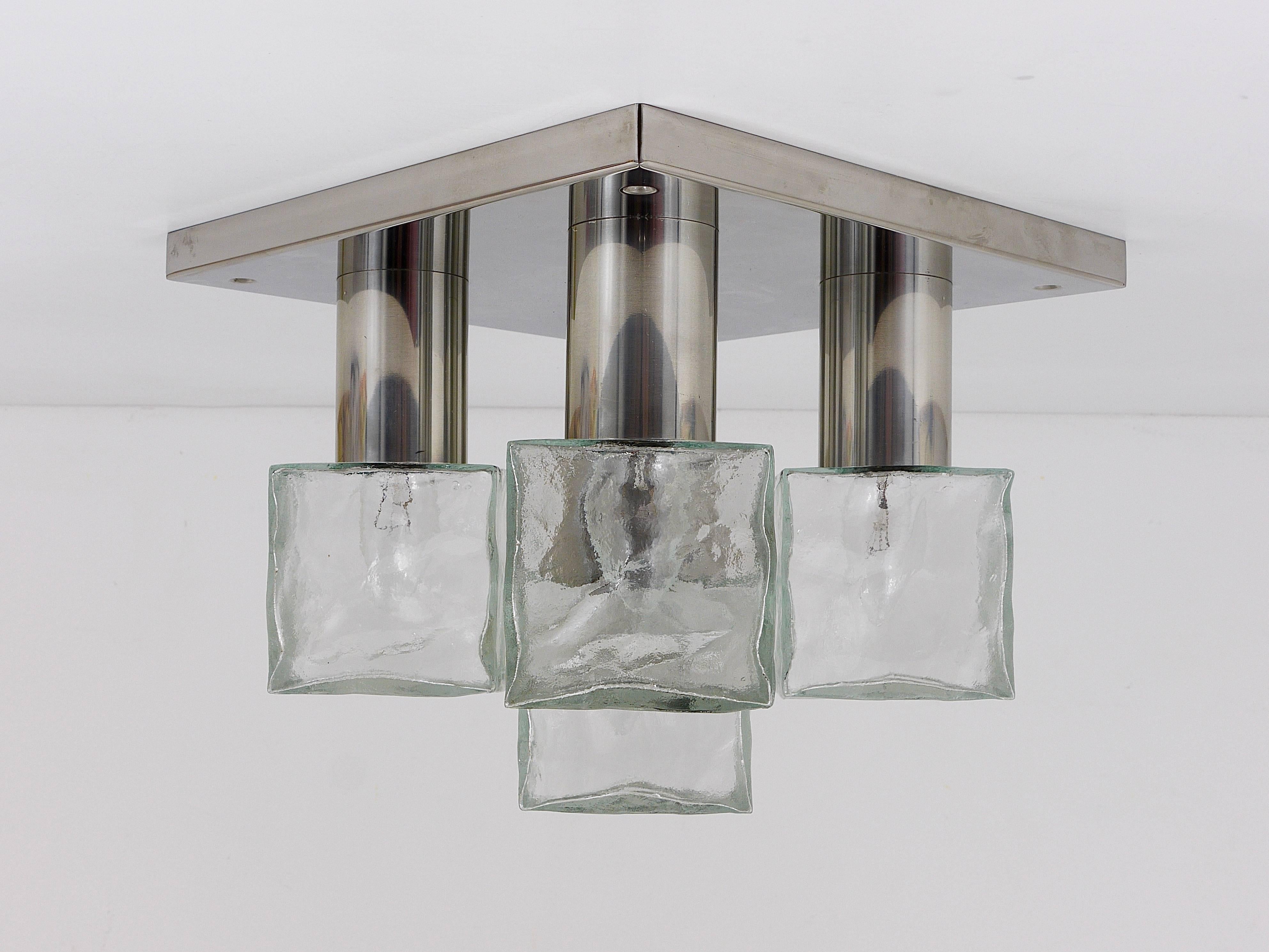A beautiful Mid-Century flush mount / ceiling light / lamp from the 1960s. Manufactured by J. T. Kalmar Vienna / Austria. Also suitable as a sconce. Labeled. Its frame is made of mirror finished stainless steel and has five nice cubic ice glass