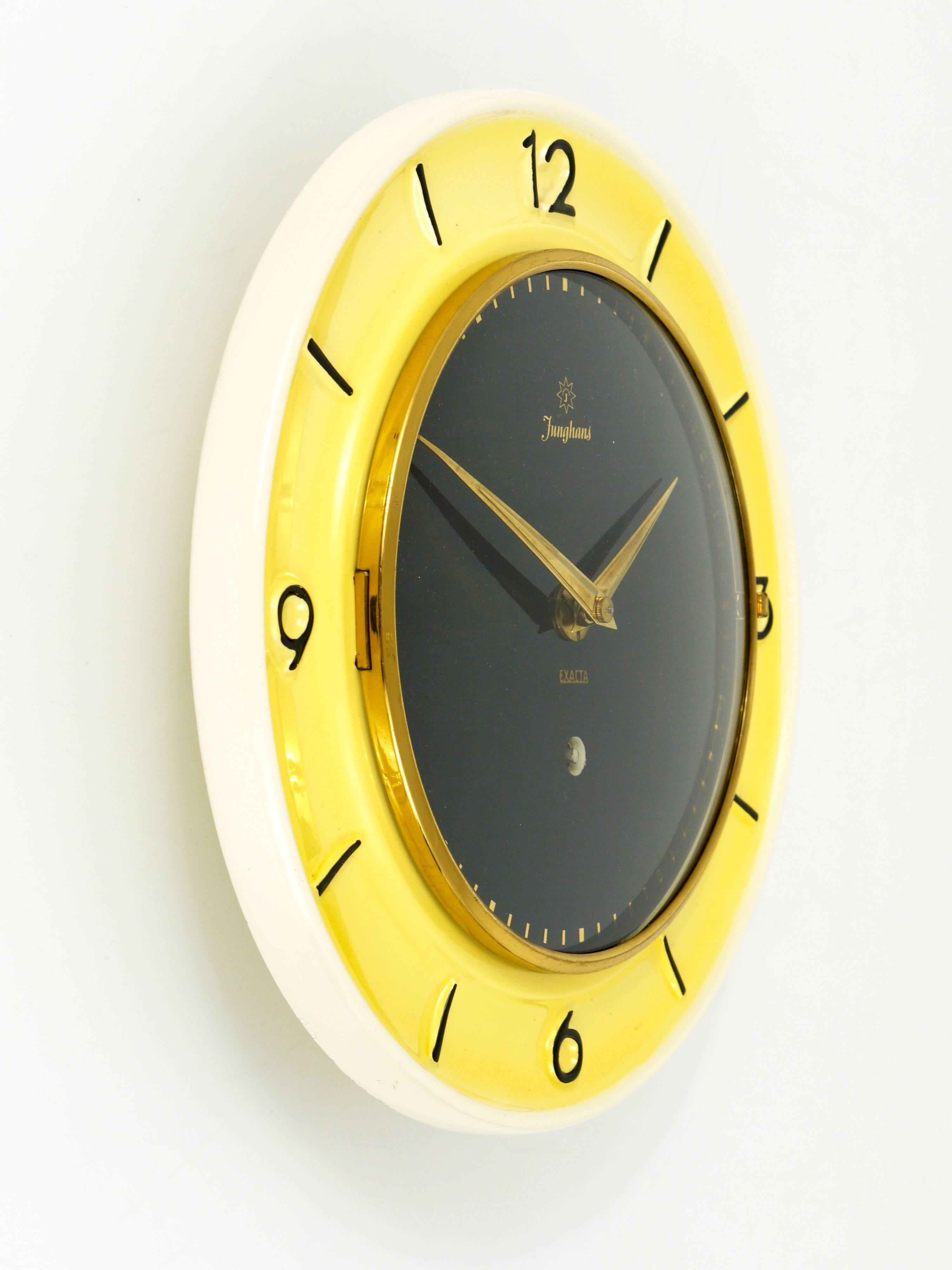 Austrian Pastel Yellow Junghans Mid-Century Brass Wall Clock, Germany, 1950s