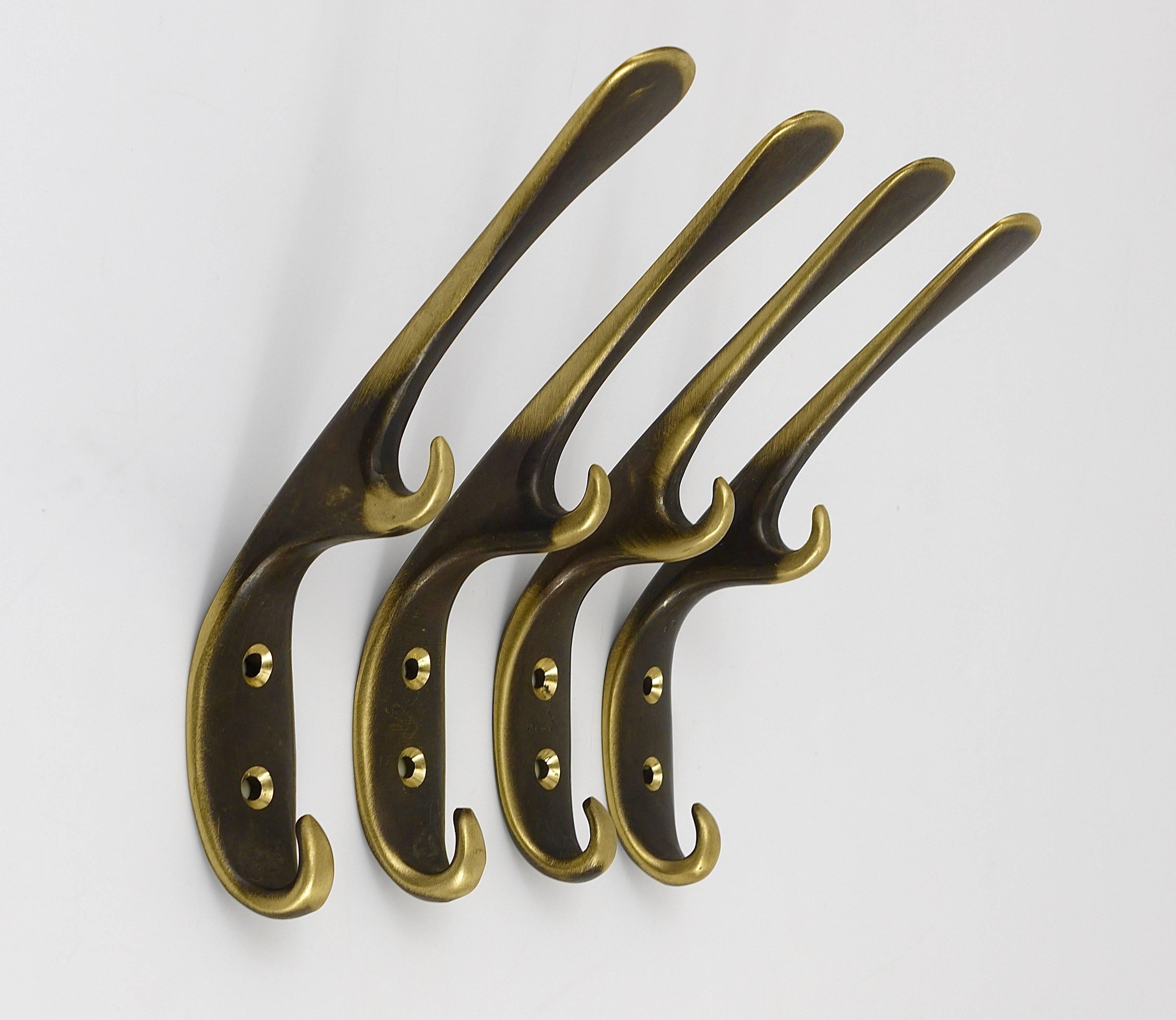 Patinated Set of Four Carl Auböck Mid-Century Brass Wall Hooks, Austria